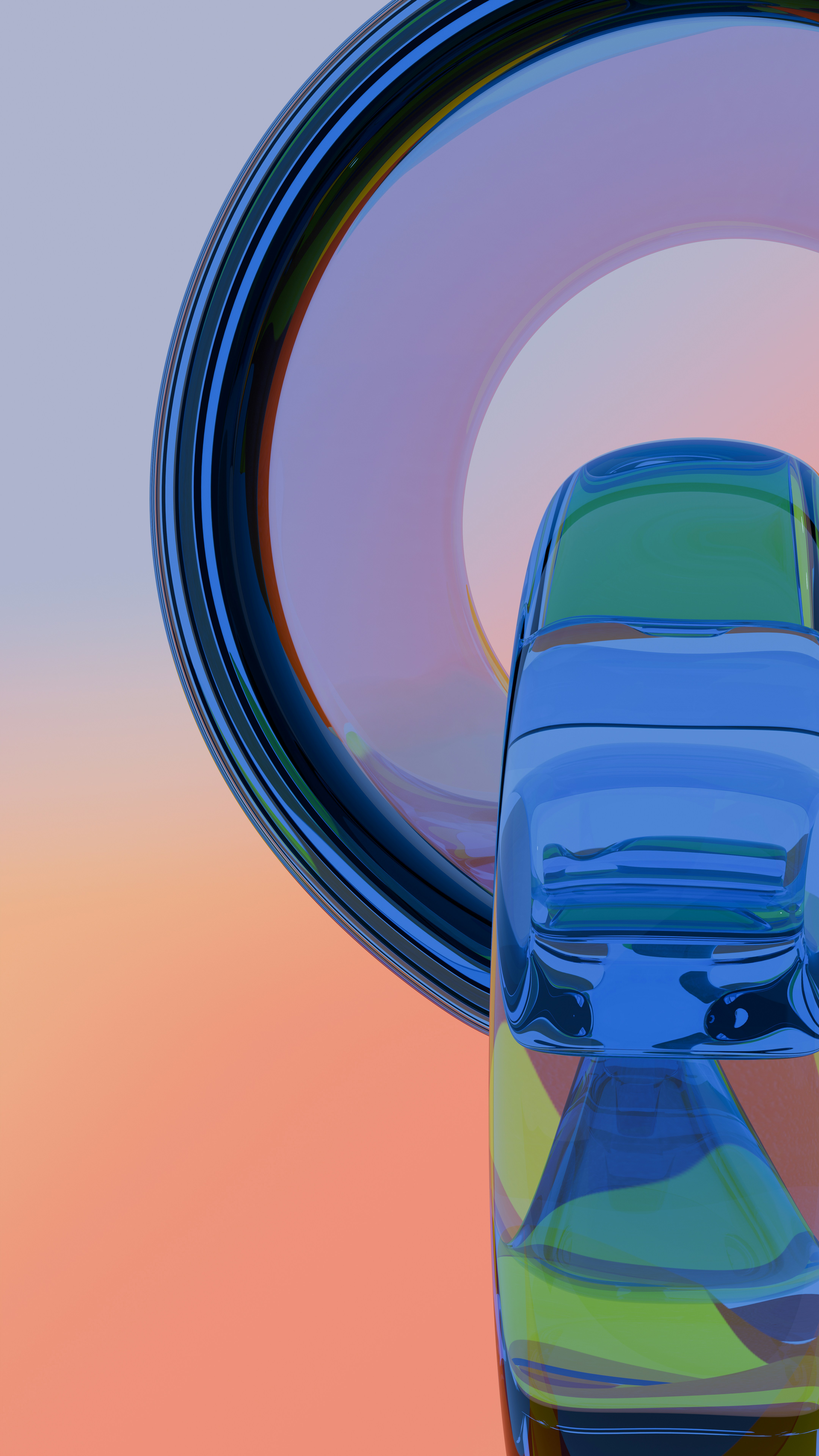 A glass vase with a blue and green car inside of it