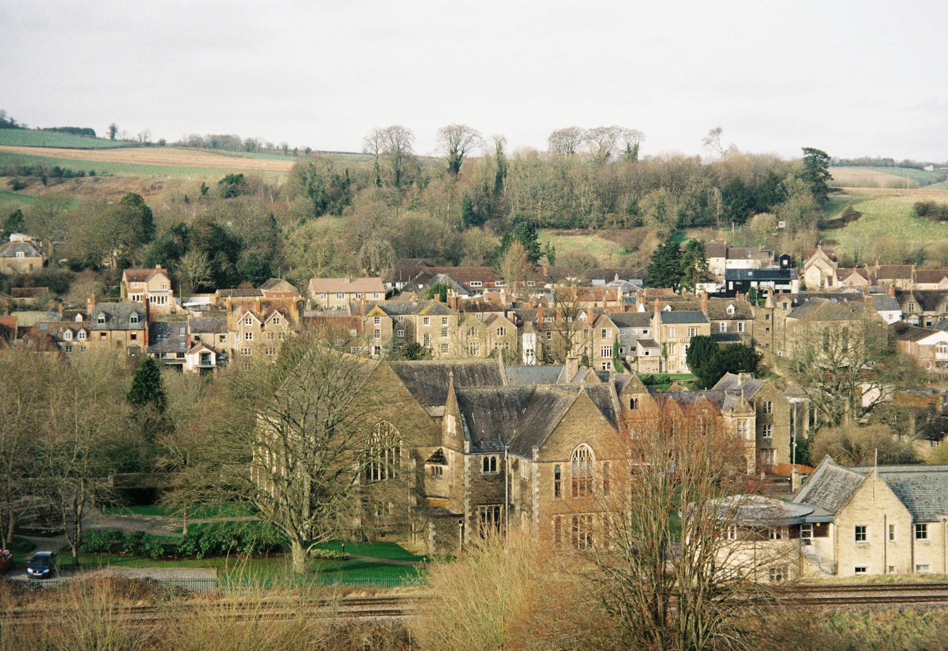 A view of a small town from a hill