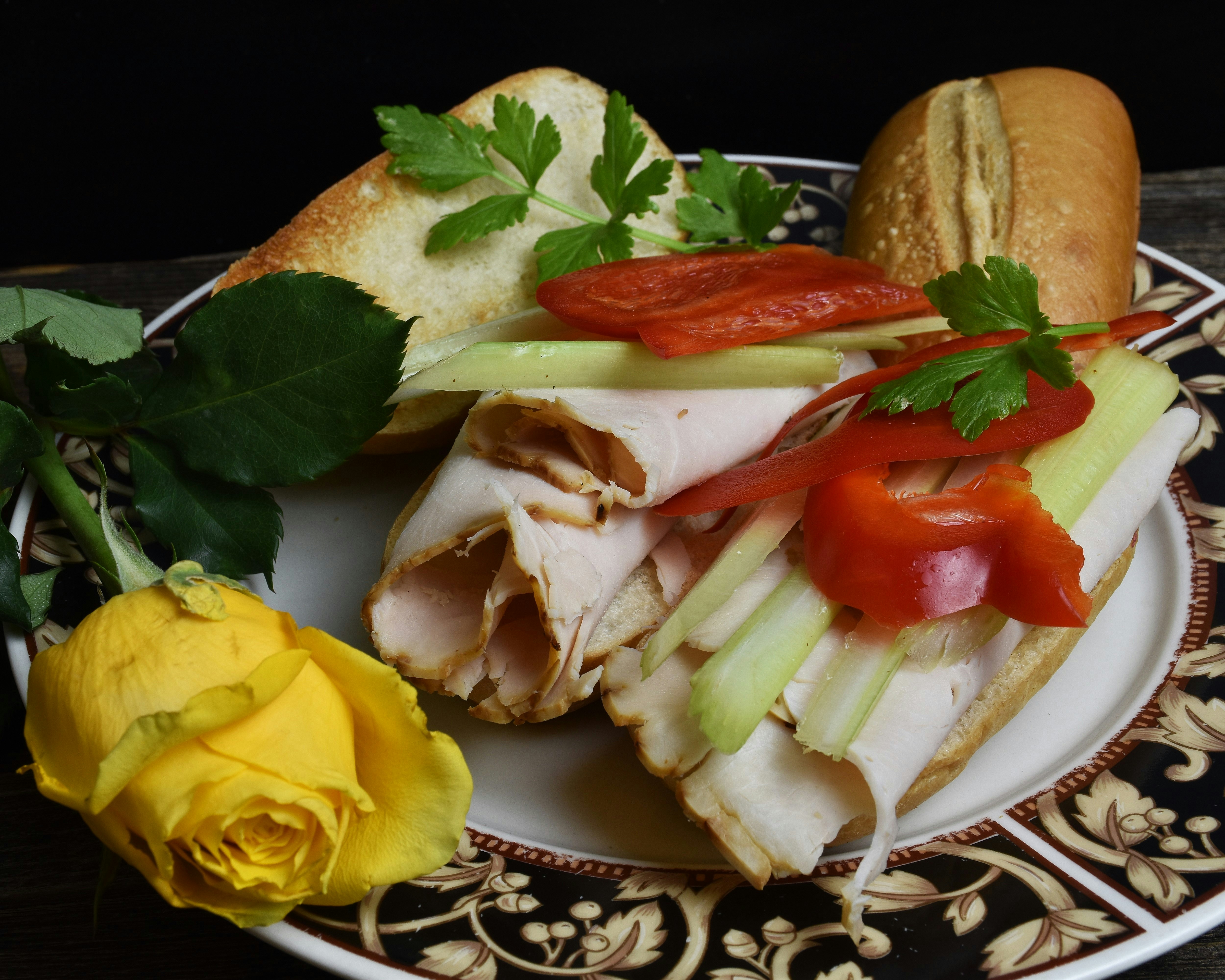 Sandwich with tomato and cucumber on a plate