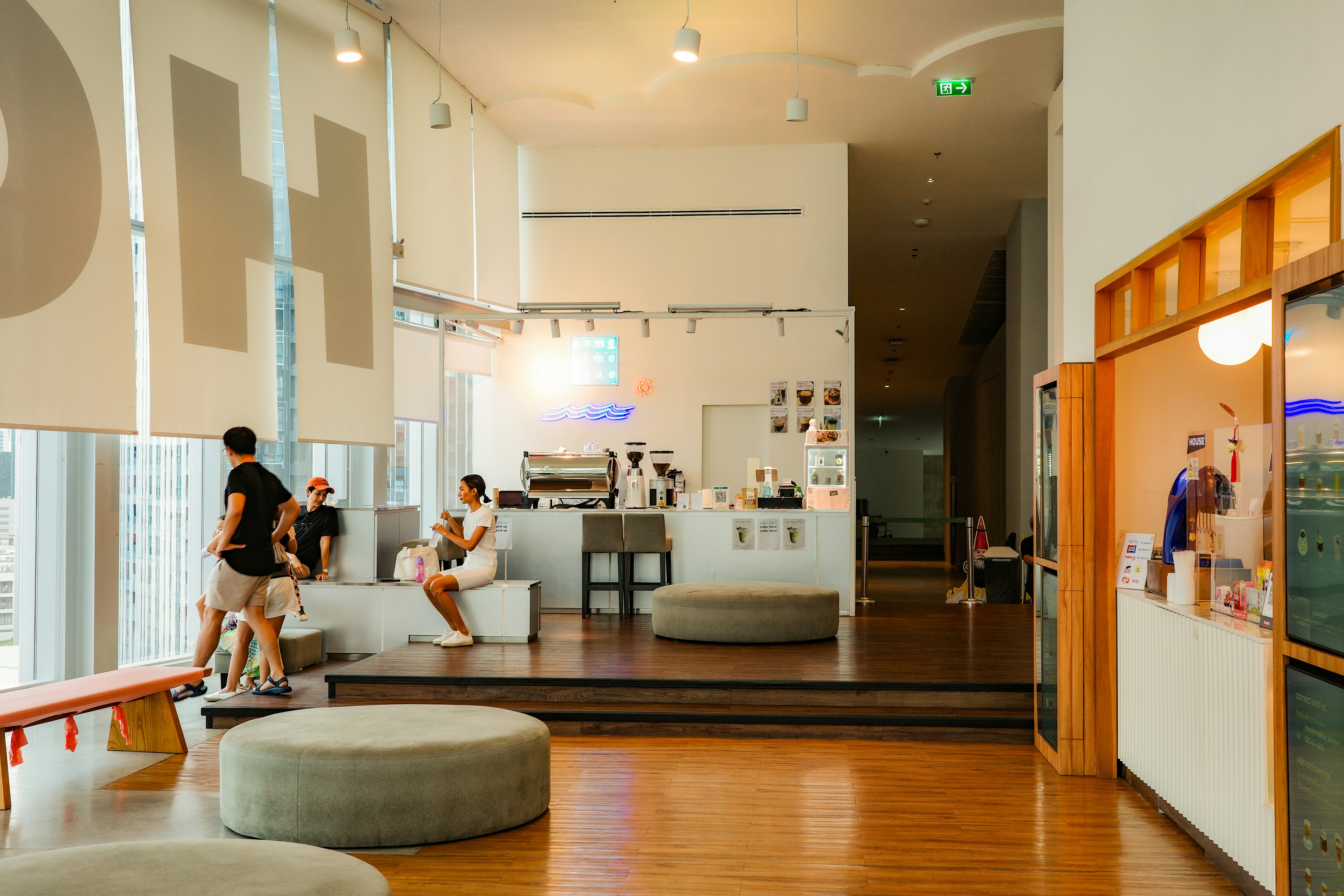 A group of people sitting in a large room