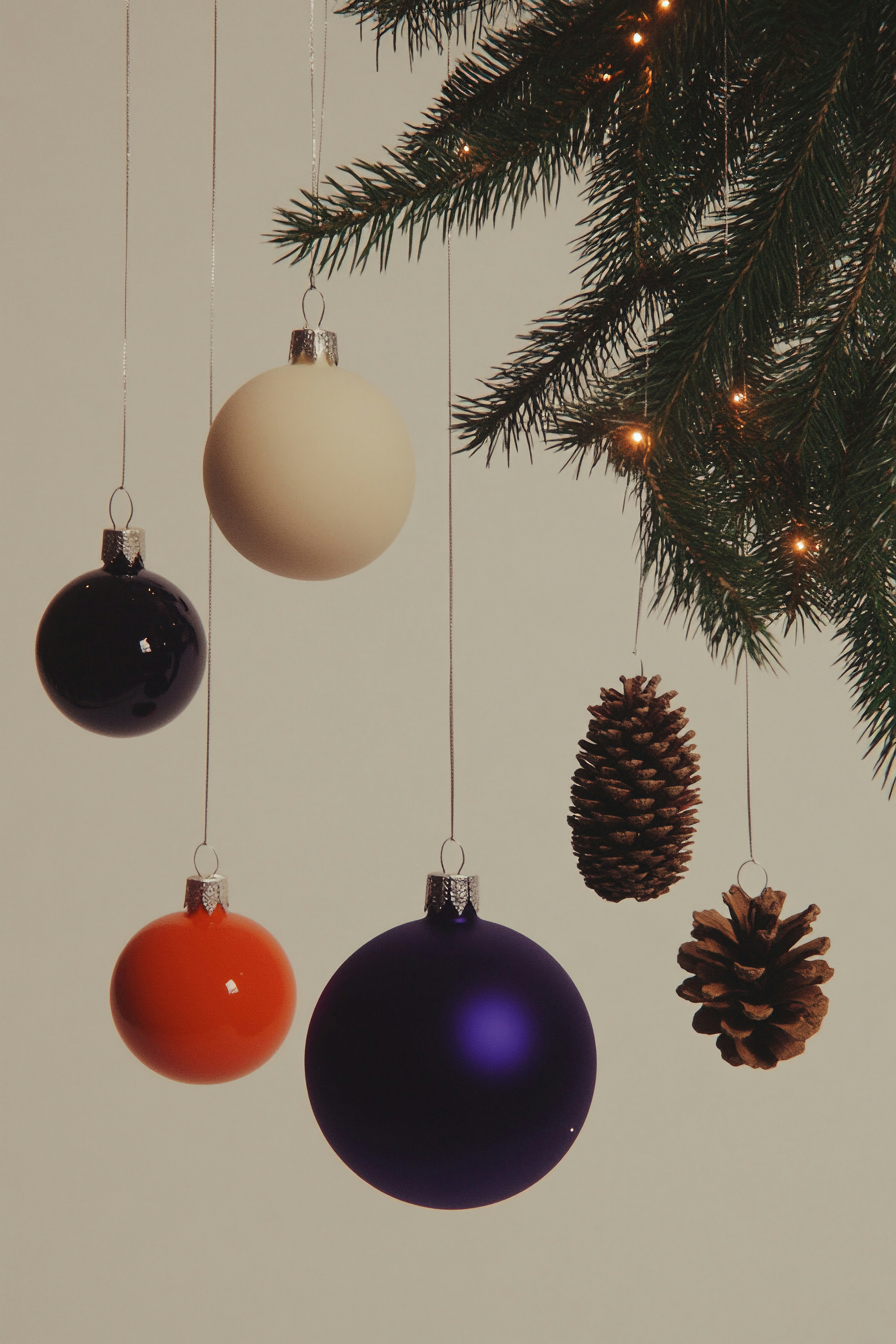 A bunch of ornaments hanging from a christmas tree