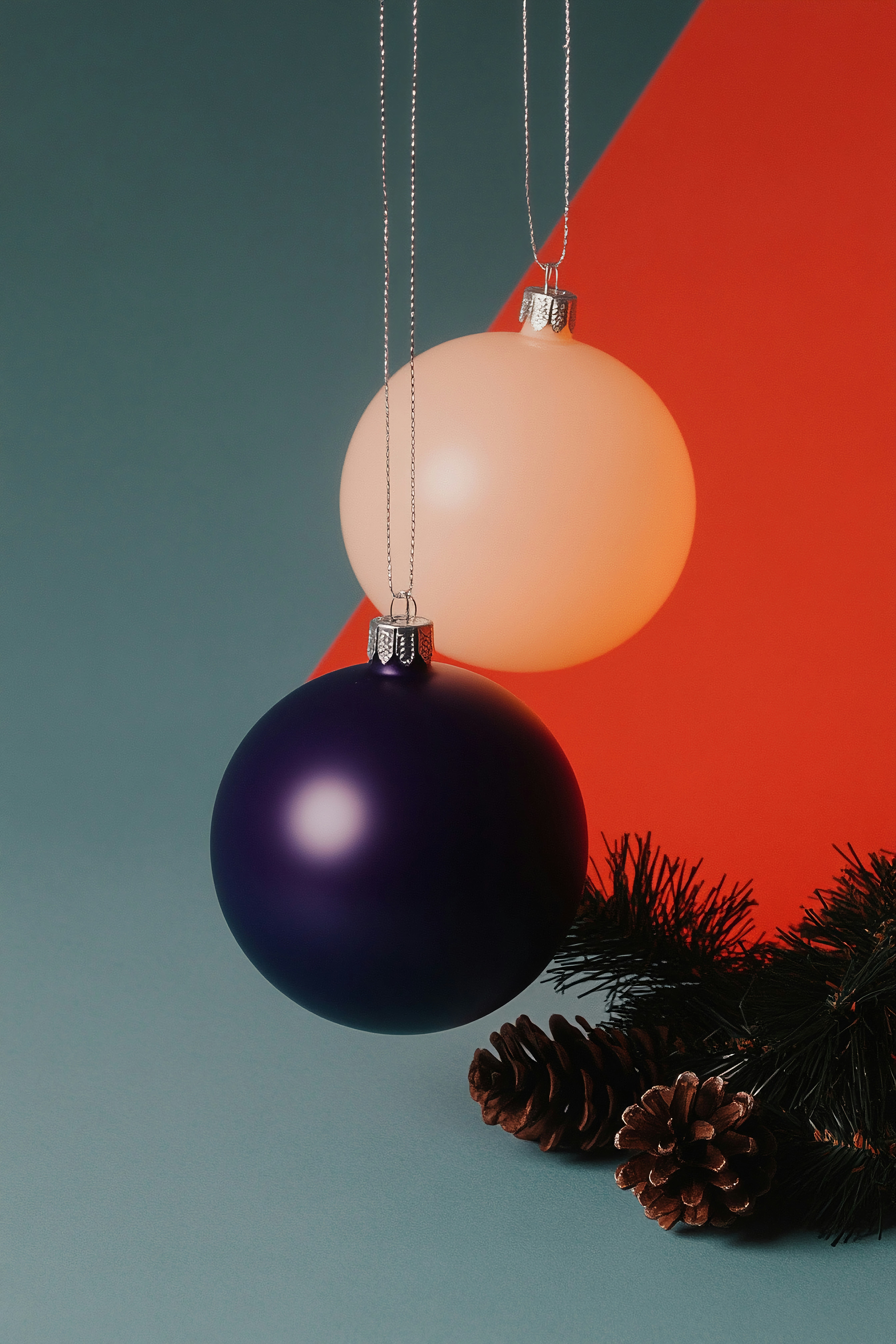 A couple of balls hanging from a string