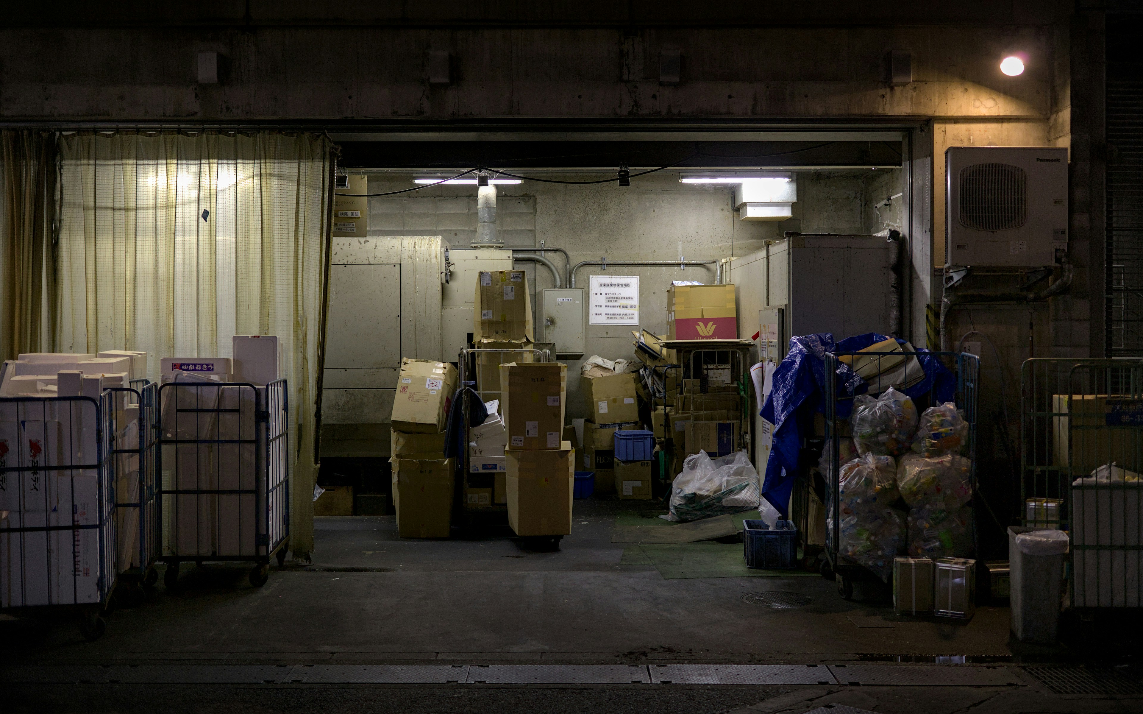 A warehouse filled with lots of boxes and boxes