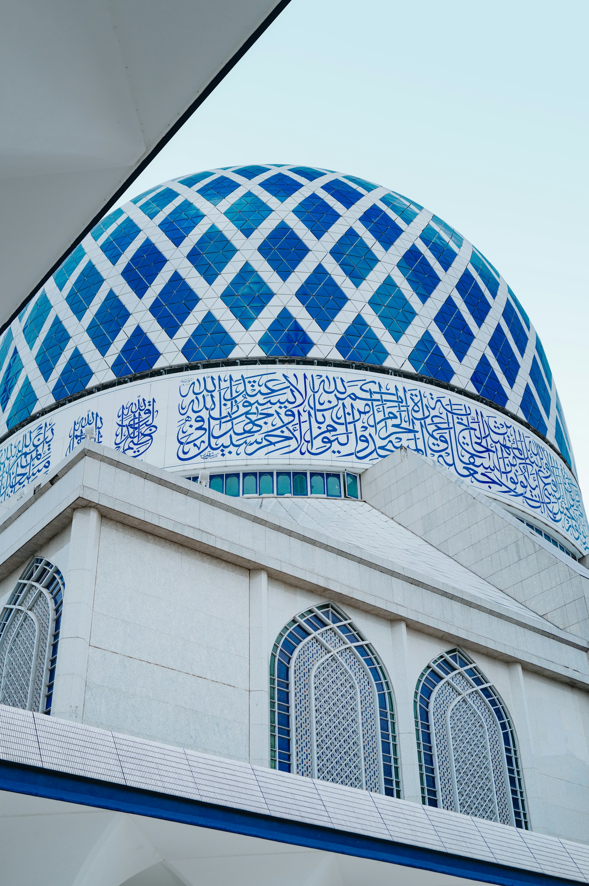 A blue and white building with a blue dome