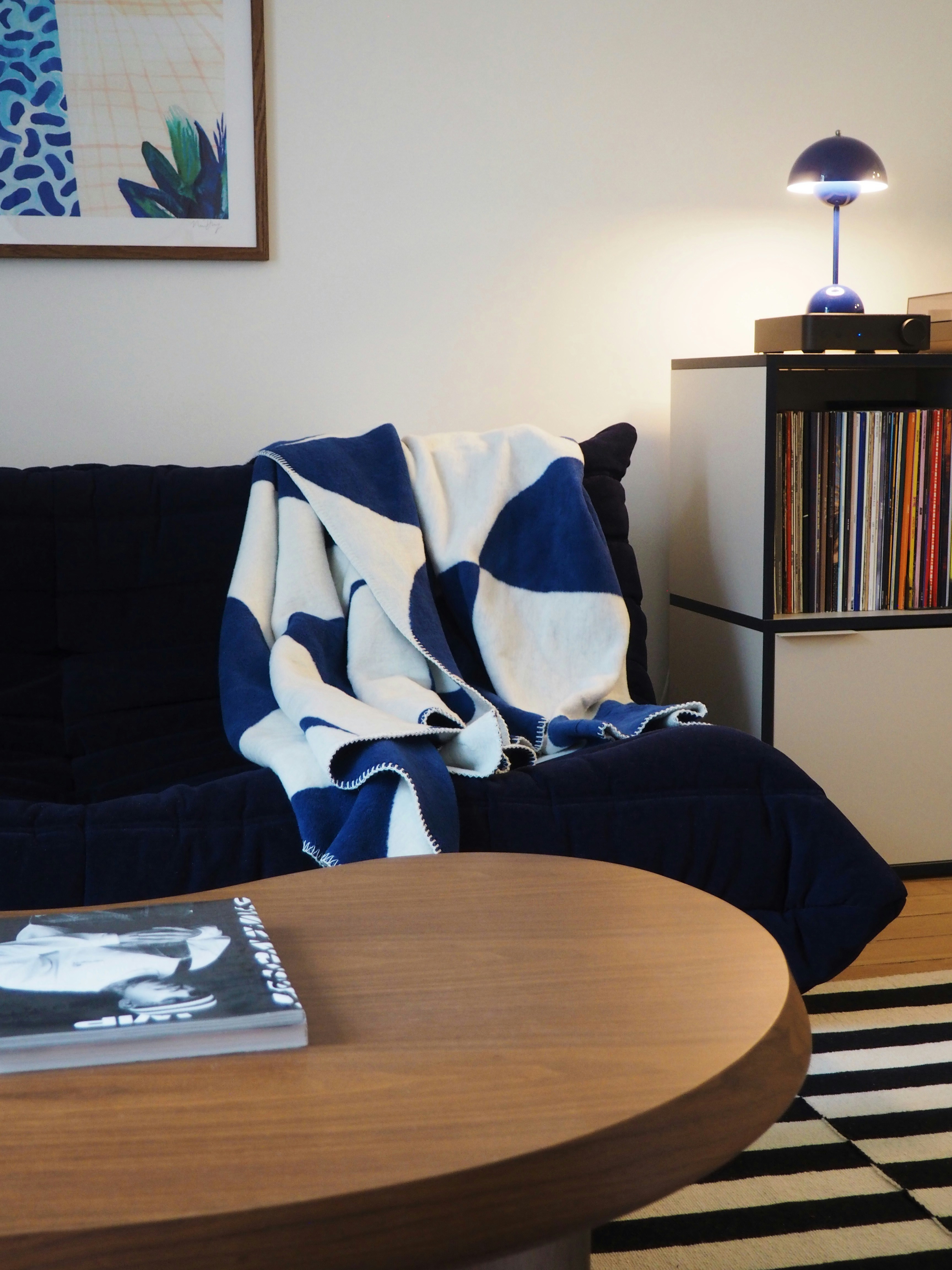 A living room with a couch and a coffee table
