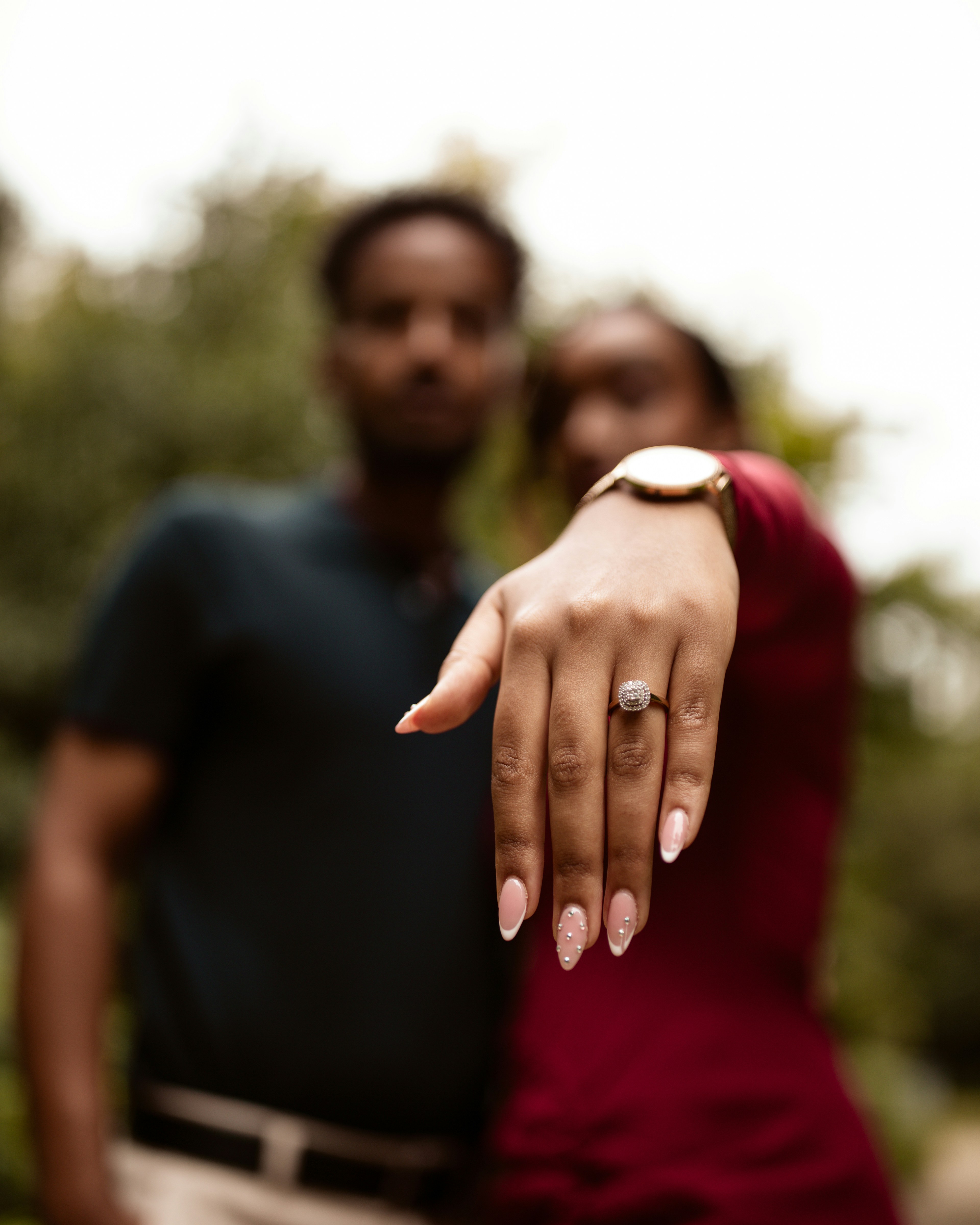 An engagement ring for couples is a timeless symbol of love and commitment, often designed to represent the unique bond between two individuals. These rings typically feature a central gemstone-commonly a diamond-set in precious metals like gold, platinum, or white gold. The design can range from classic solitaires to intricate settings with pavé or halo accents. For couples, matching or complementary designs may also be an option, incorporating personal touches like engravings, unique stones, or symbolic motifs that reflect their shared journey and love story.