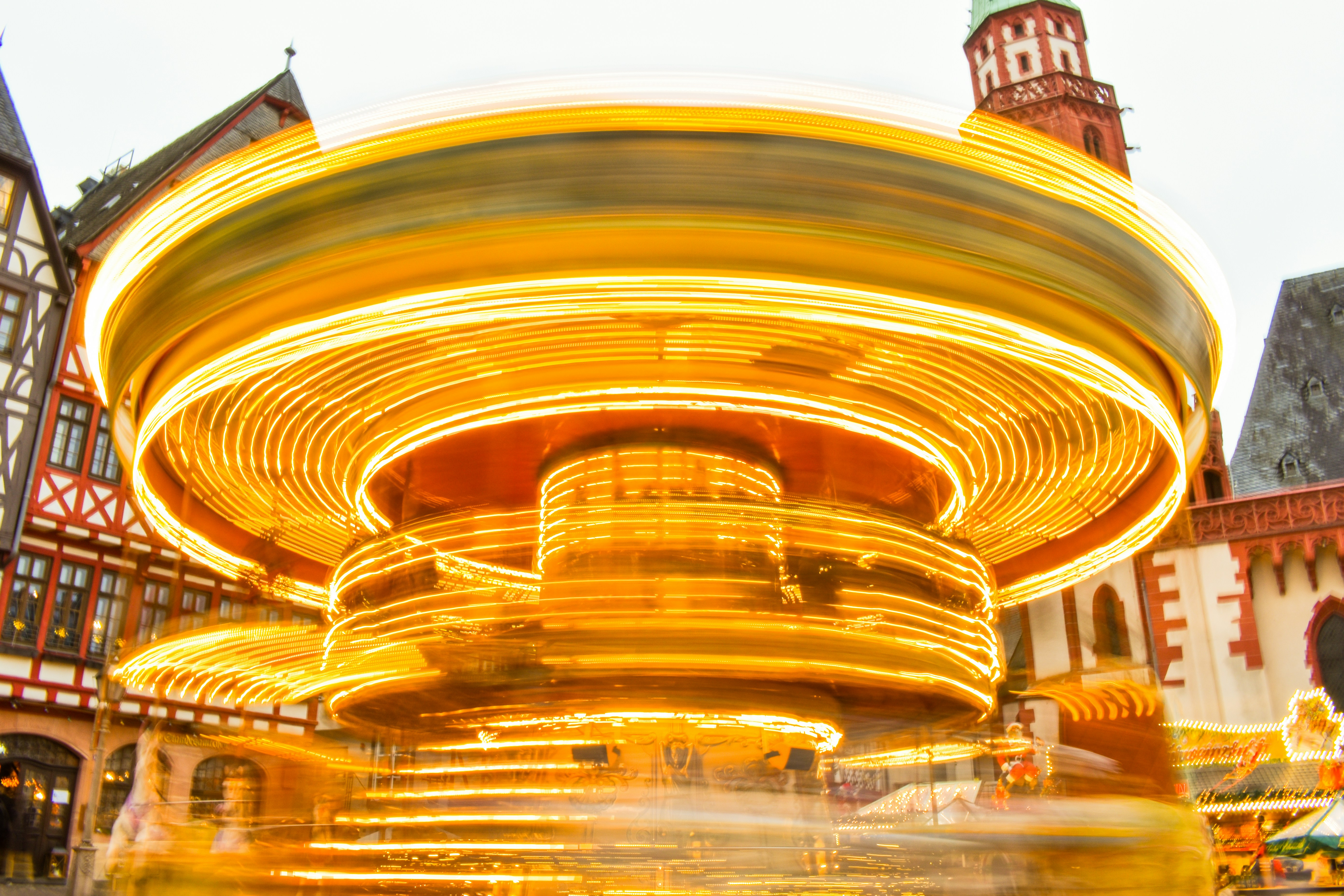 A blurry photo of a merry go round ride