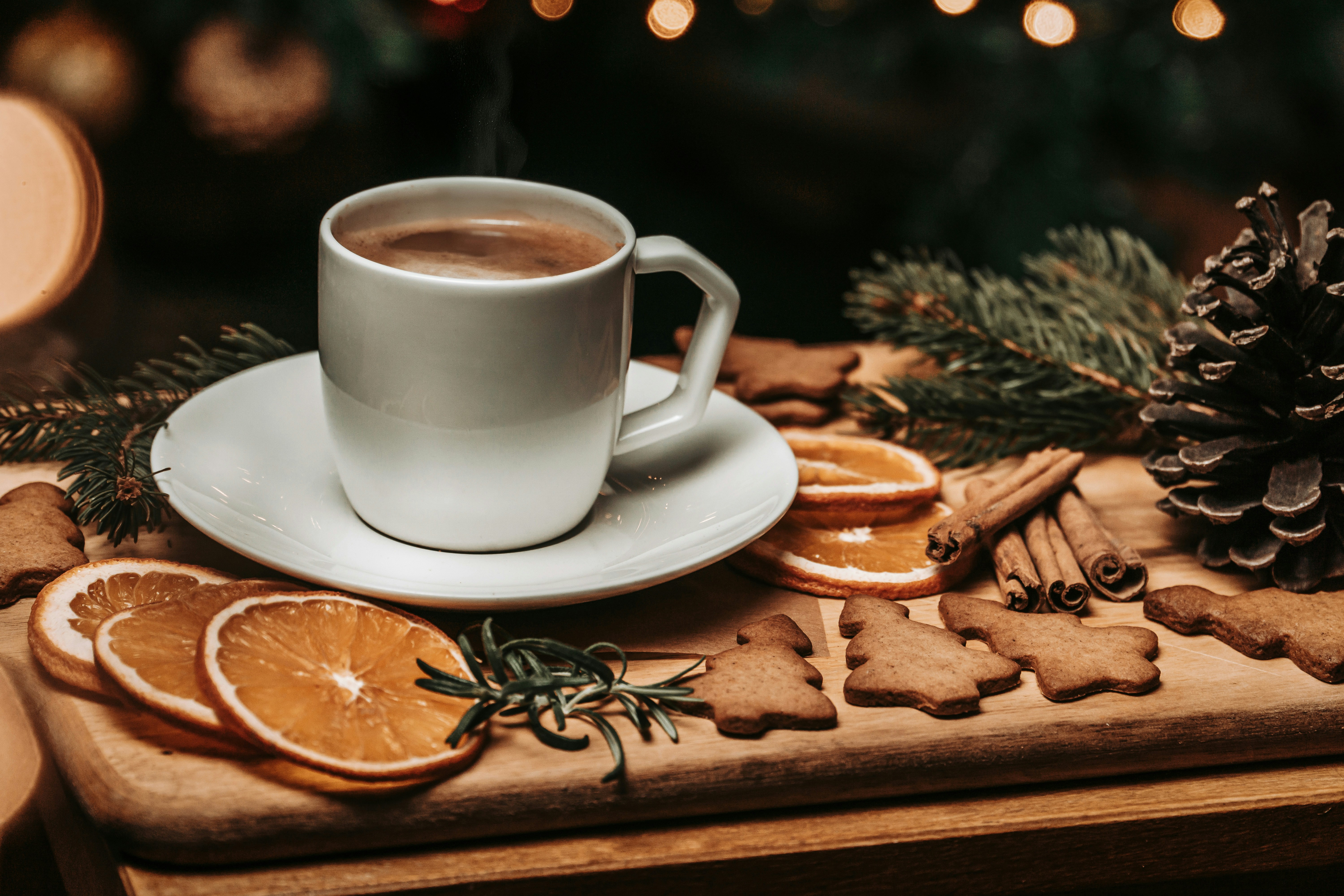 An elegant Christmas wish list for adults with a cup of coffee