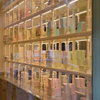 A large display case filled with lots of bottles