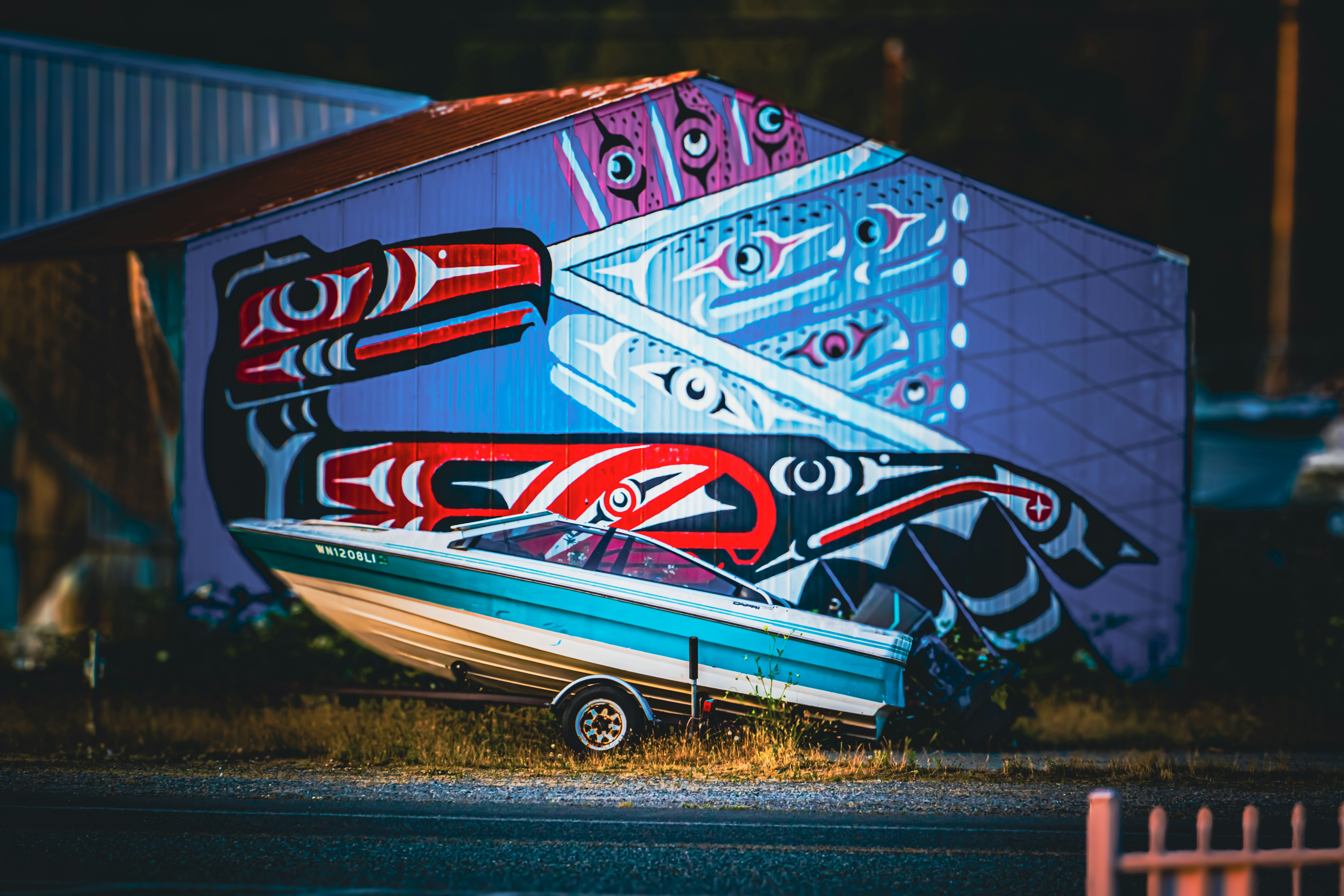 A boat is parked on the side of a building