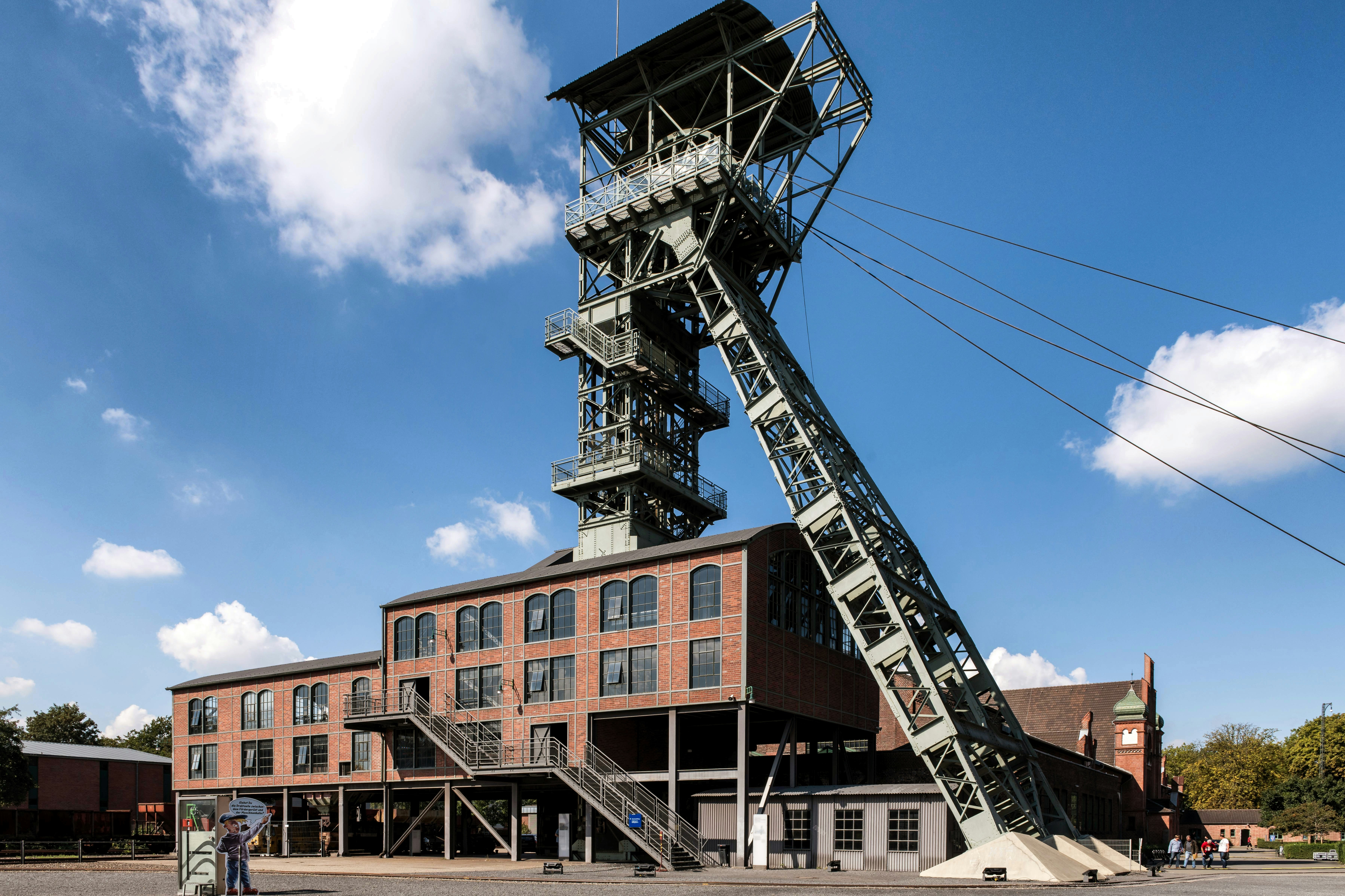 A tall metal structure with a ladder on top of it