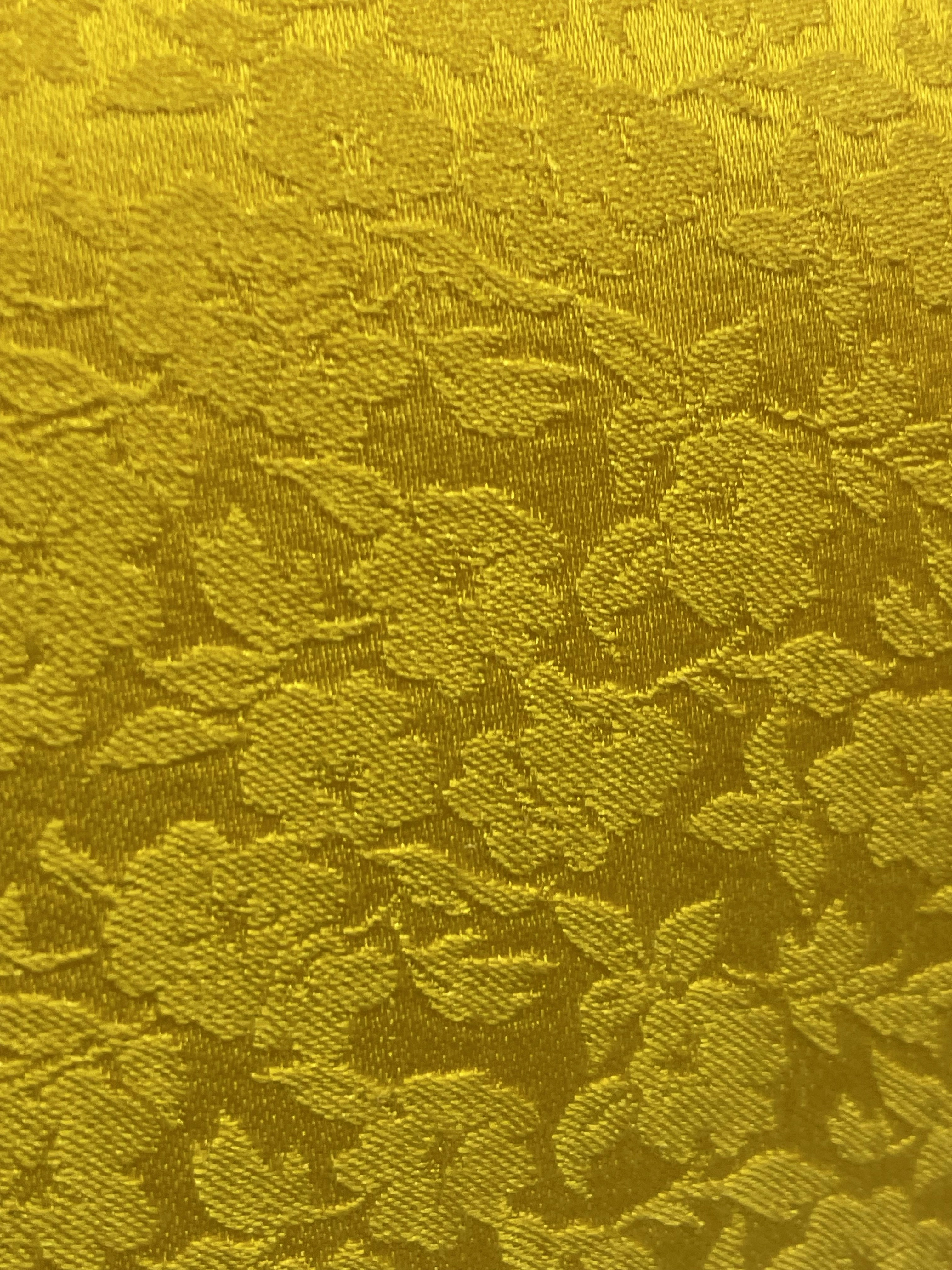 Close-up detail of tropical floral print fabric texture