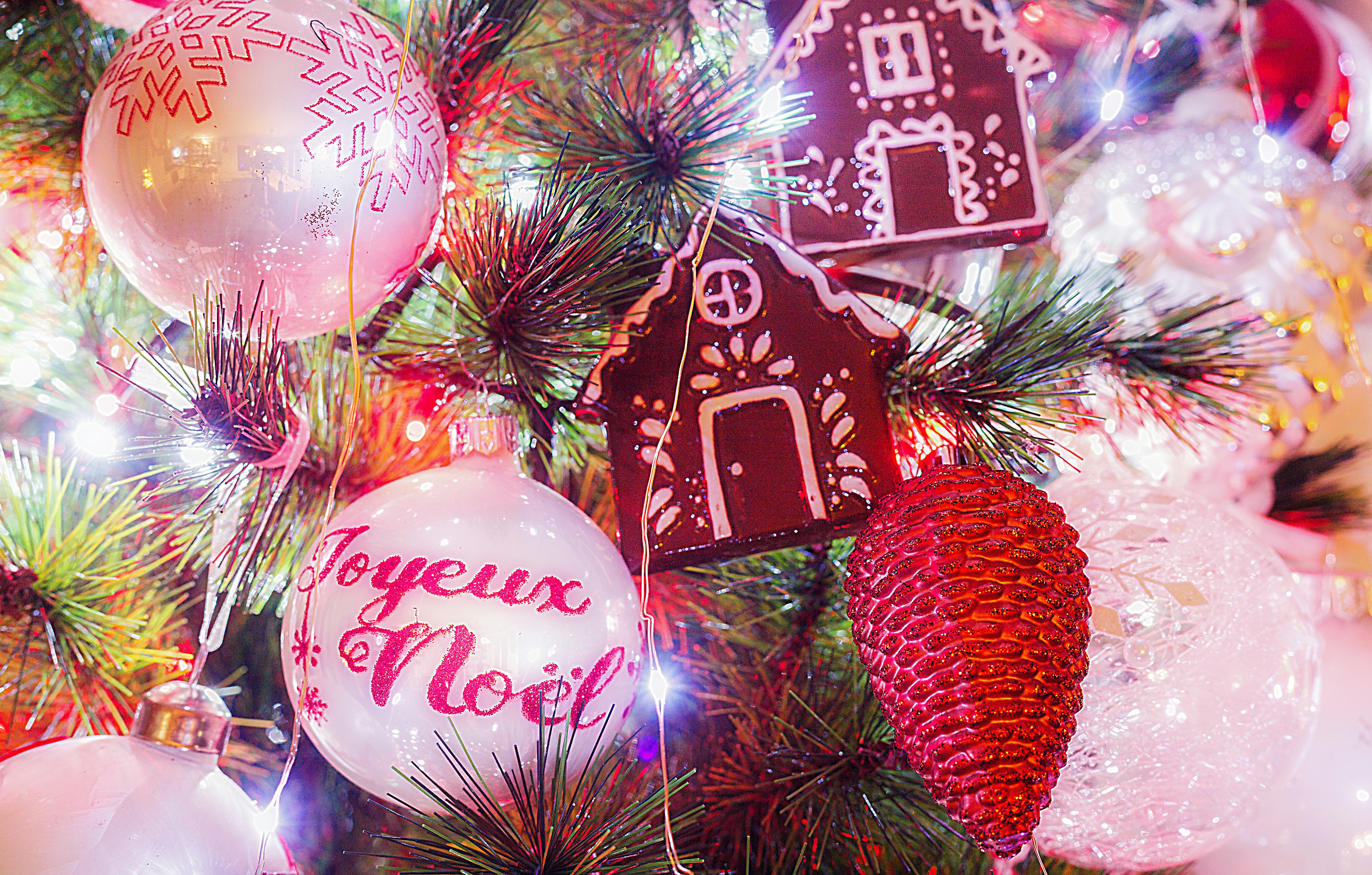 A close up of a christmas tree with ornaments photo – Free Noël Image ...
