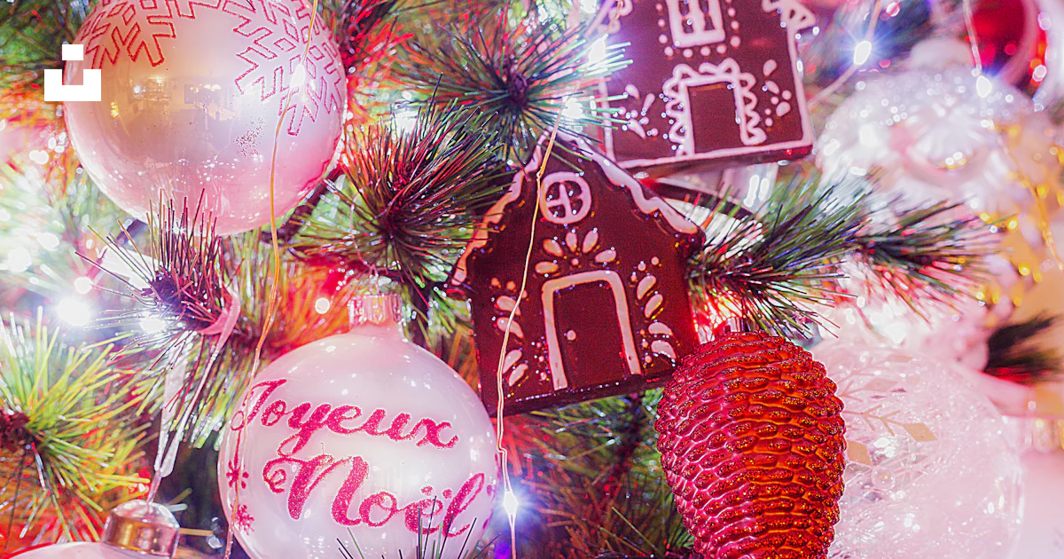 A close up of a christmas tree with ornaments photo – Free Noël Image ...