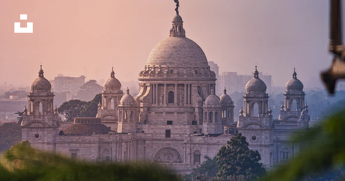 A view of a large building from a distance photo – Free Building Image ...