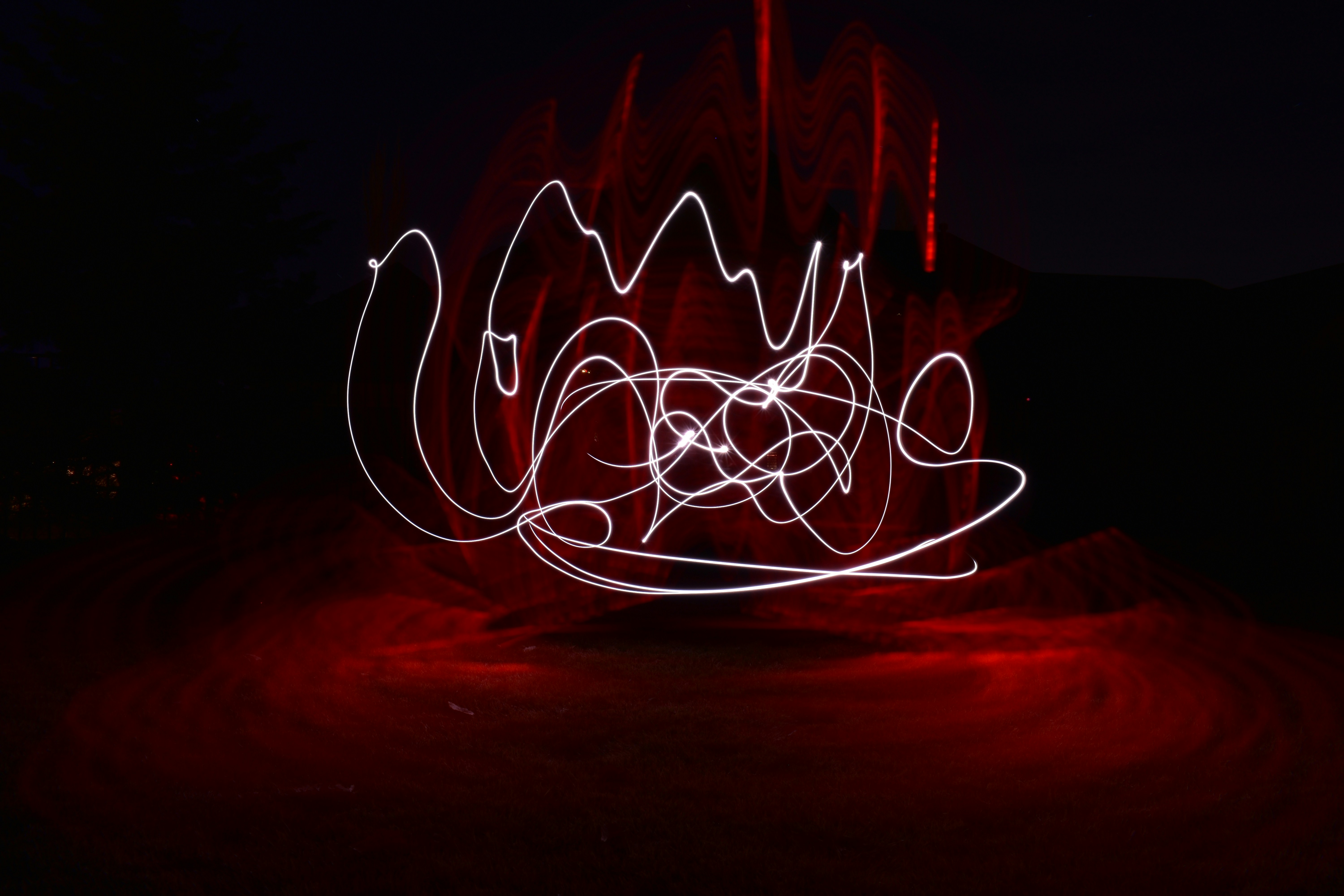 A blurry photo of a red light in the dark