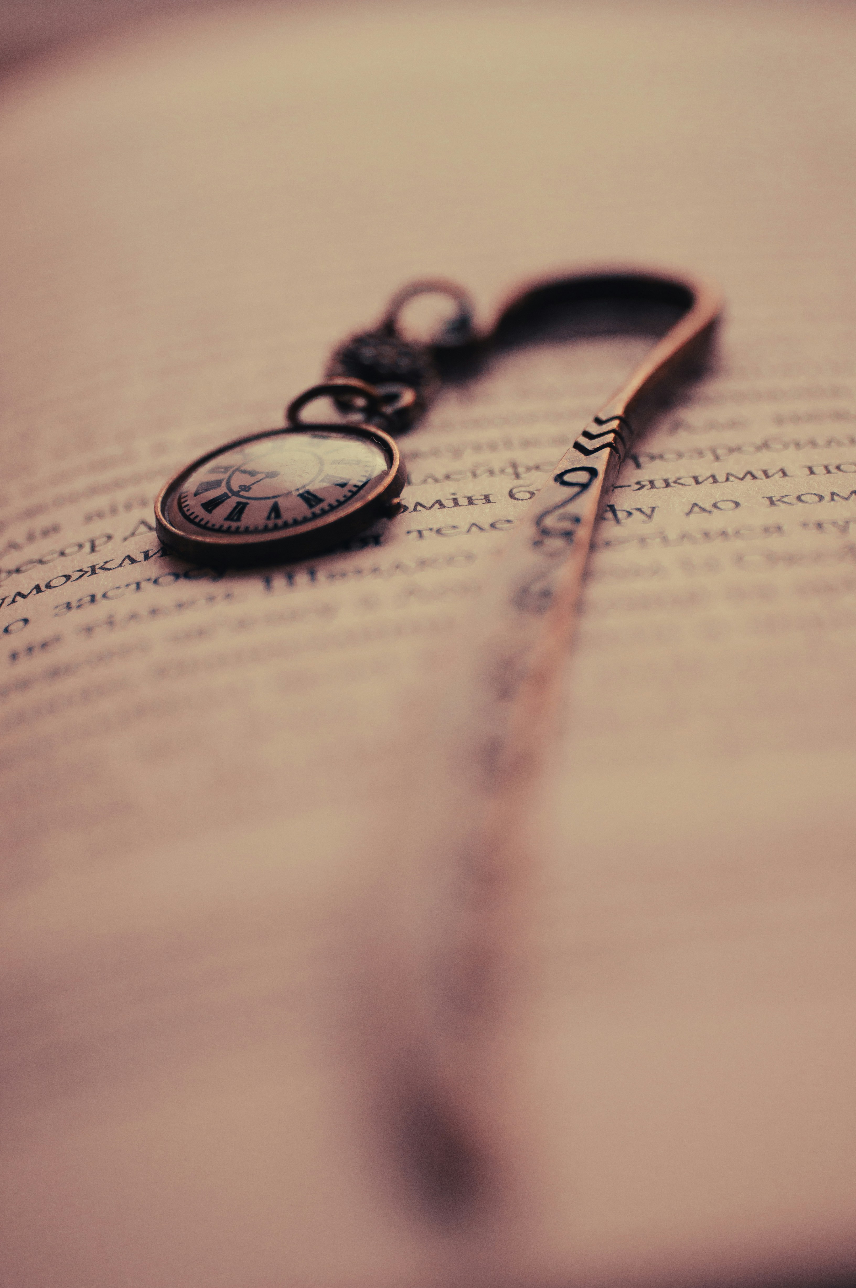 A close up of a book with a key on it