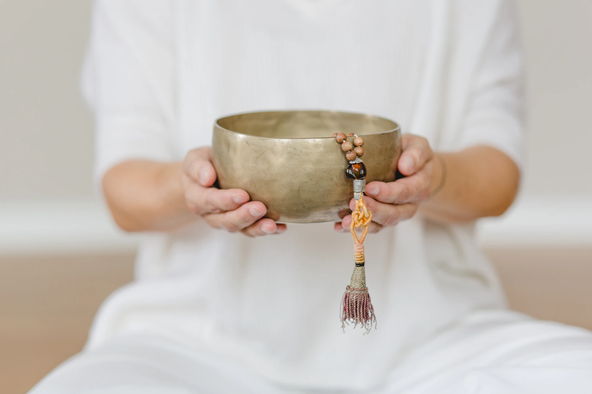 A person holding a bowl in their hands