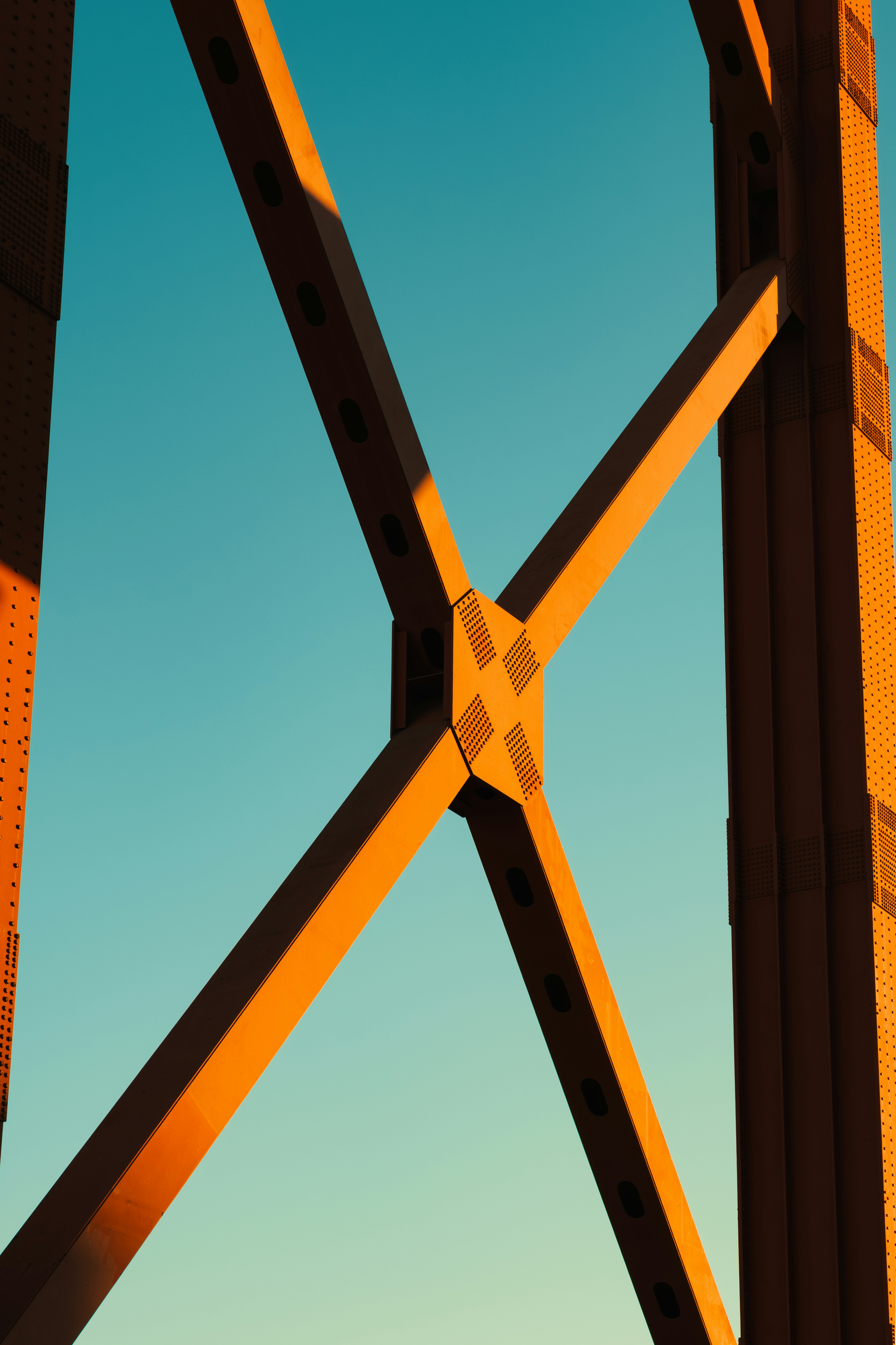 A close up of a bridge with a sky in the background