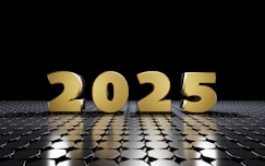 A black and gold background with the number 205