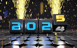 A 3D image of a number of blocks with fireworks in the background