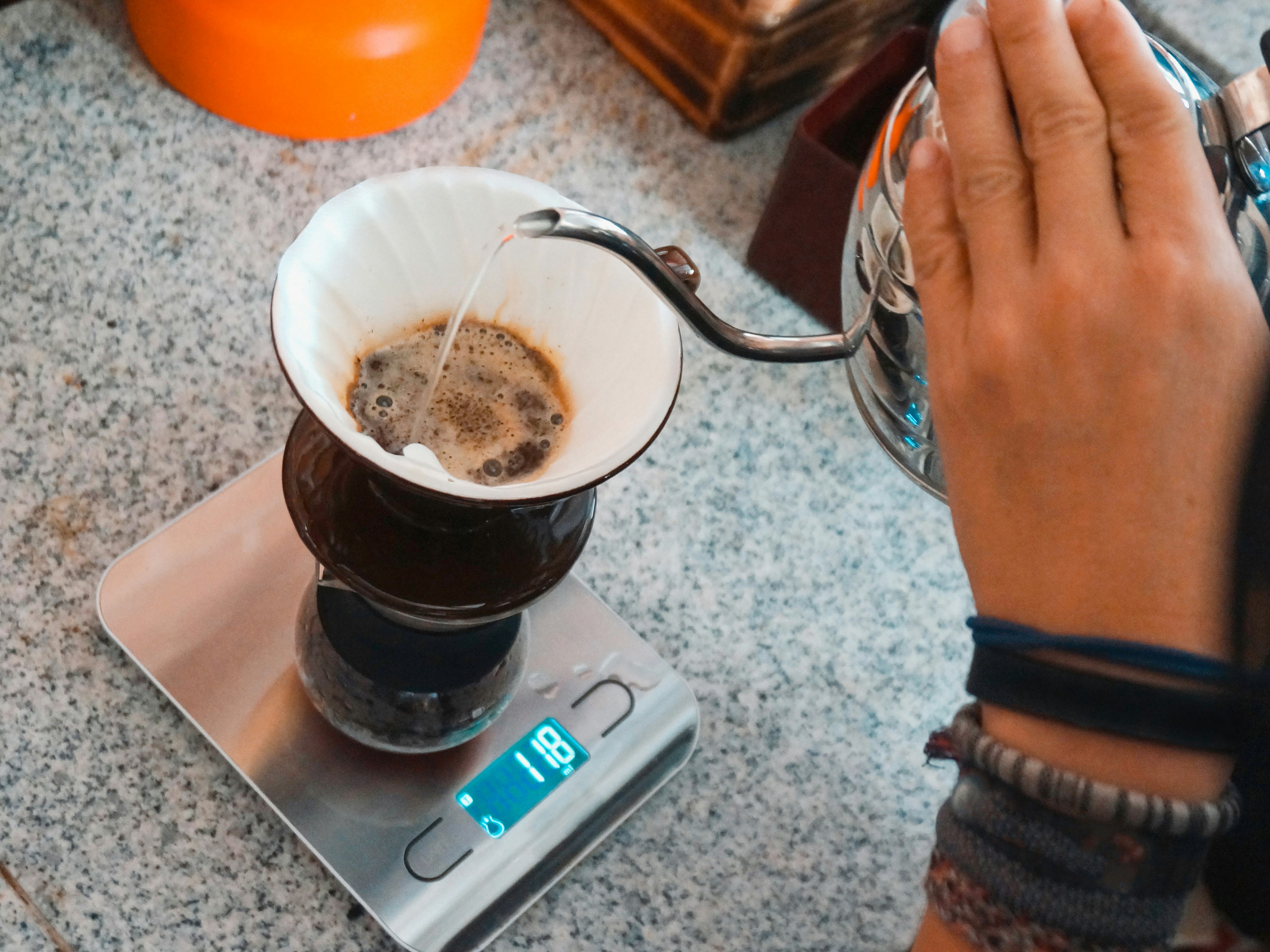 Pour-over coffee brewing on a scale