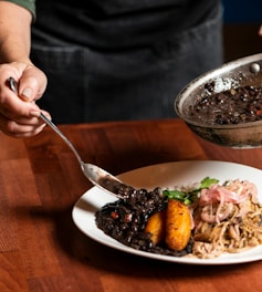 A plate of food on a wooden table