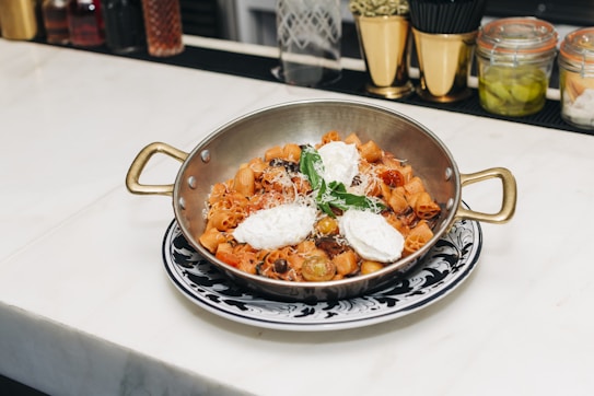A bowl of food sitting on top of a counter