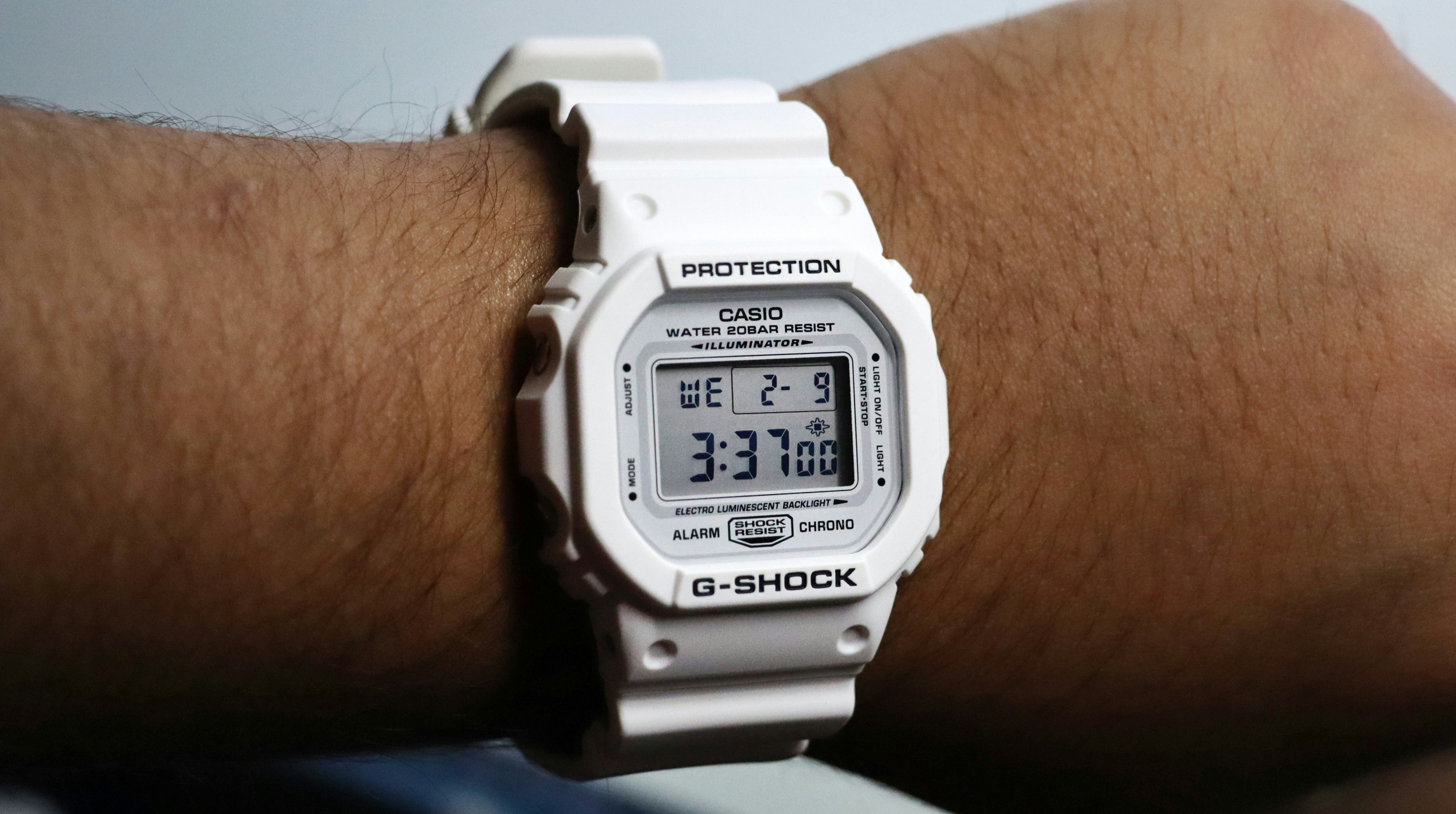 A close up of a person wearing a watch