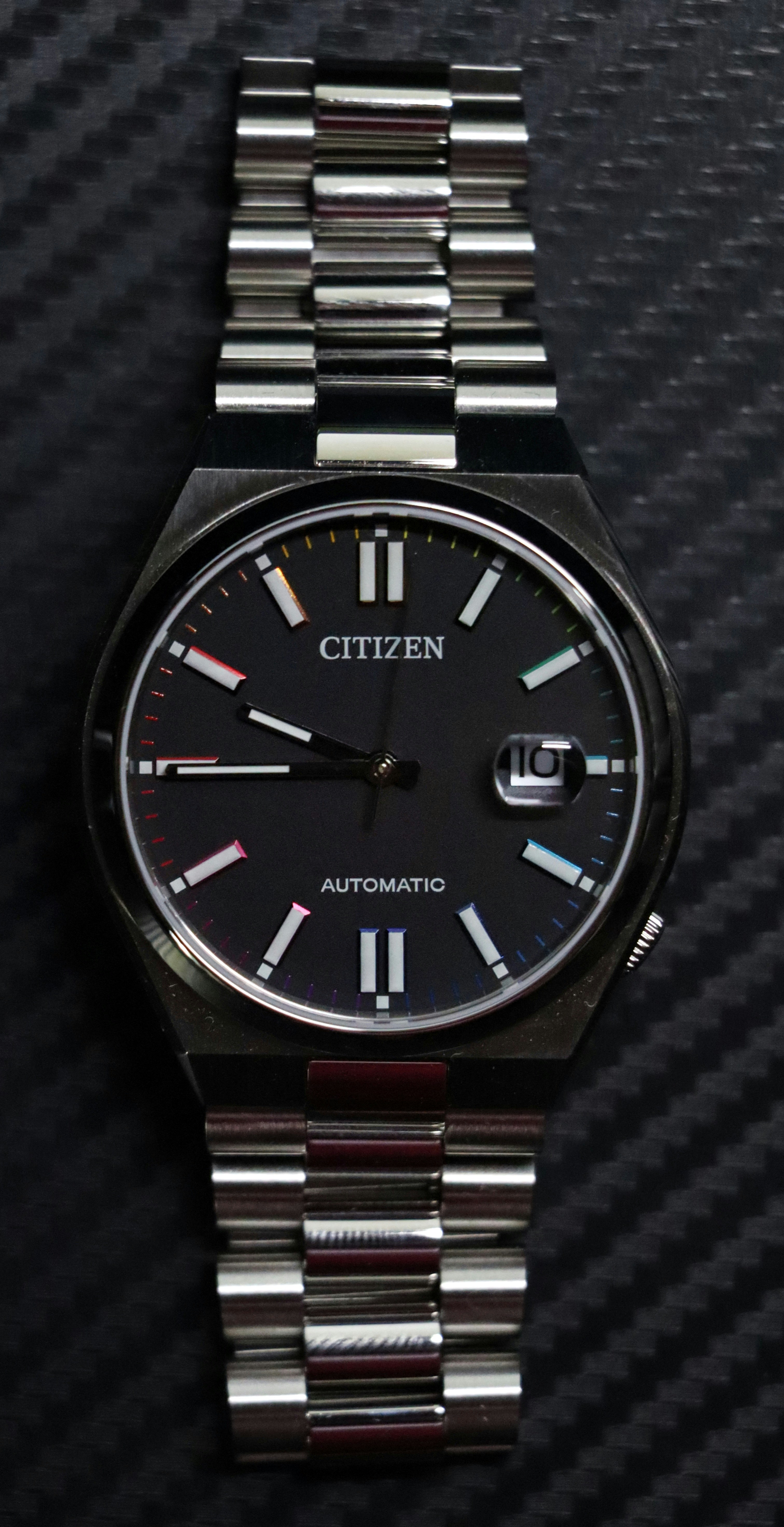 A close up of a watch on a table