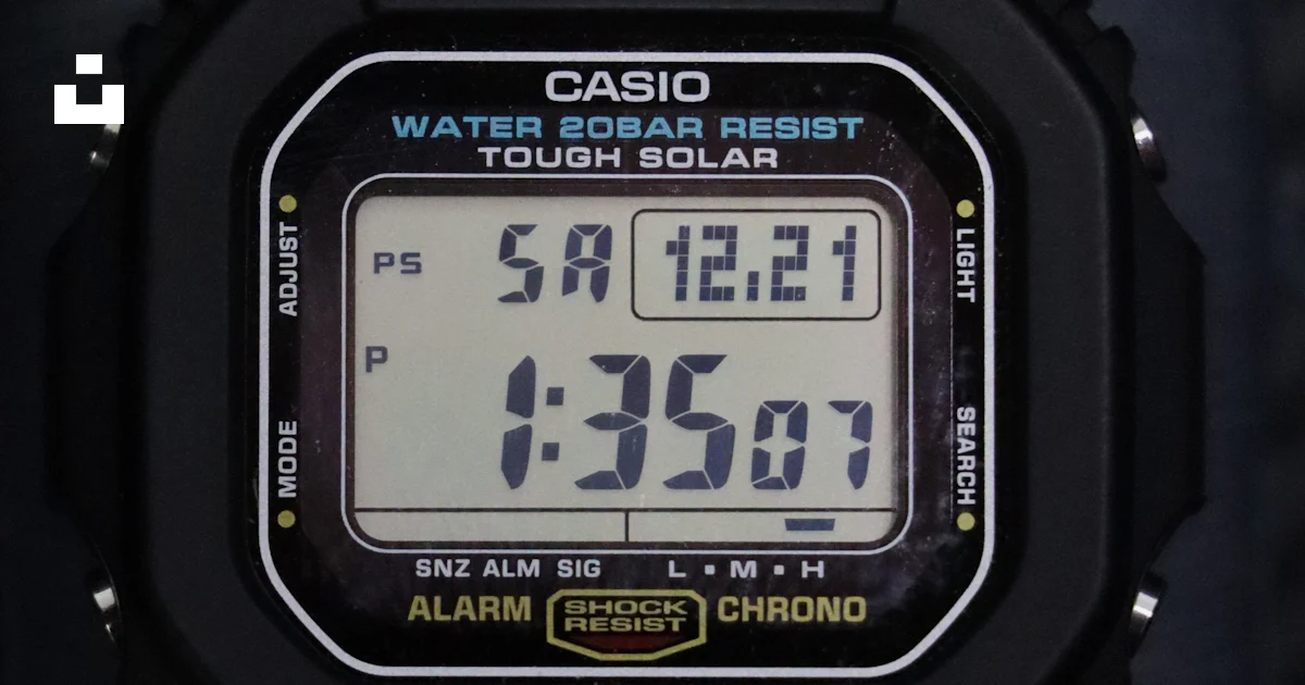 A close up of a watch on a black surface photo – Free Abstract pattern ...