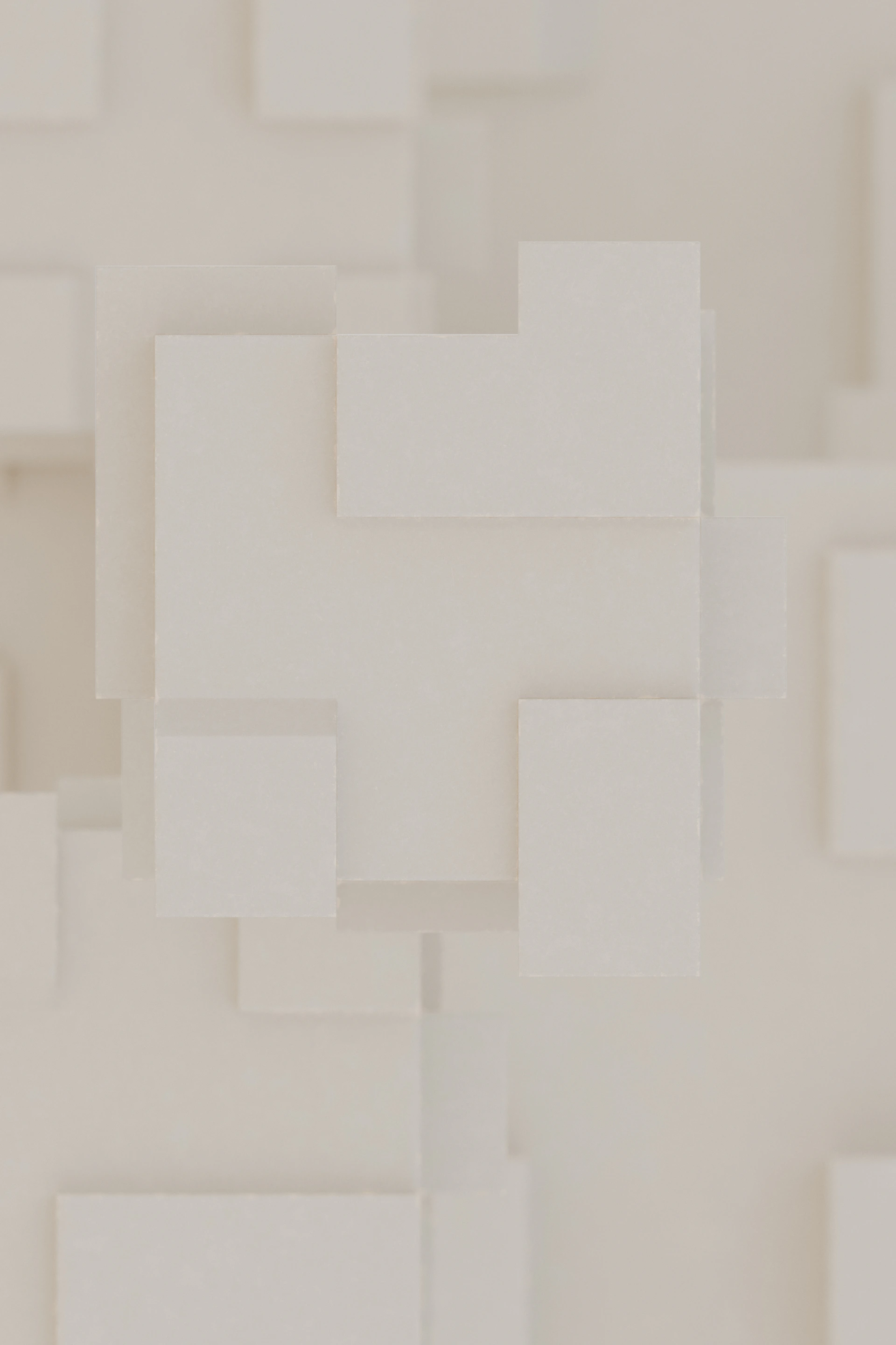 A white wall with a bunch of squares on it