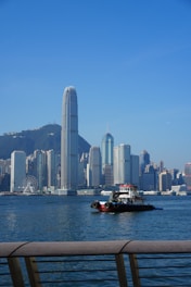 A large body of water with a city in the background