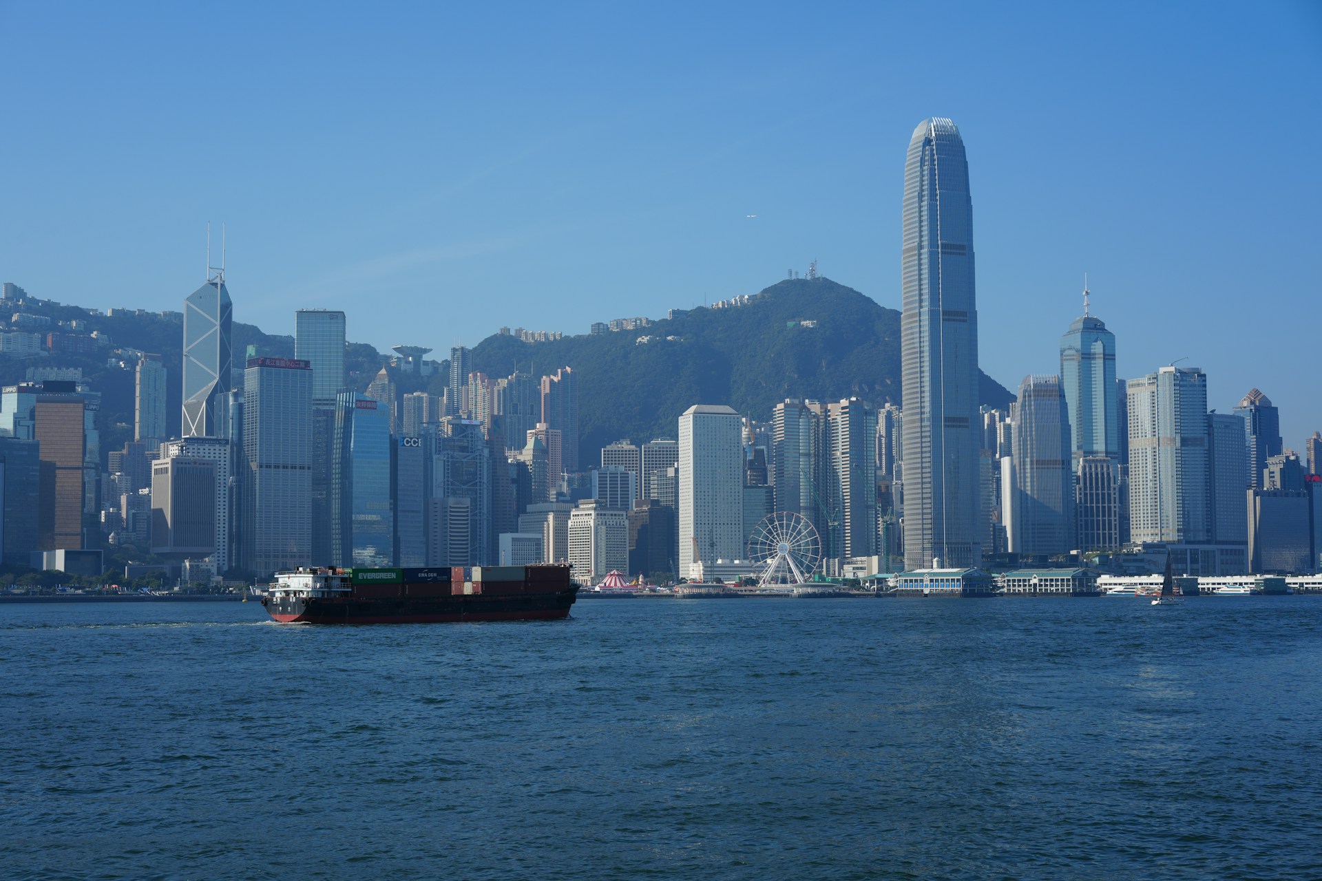 A large body of water with a city in the background