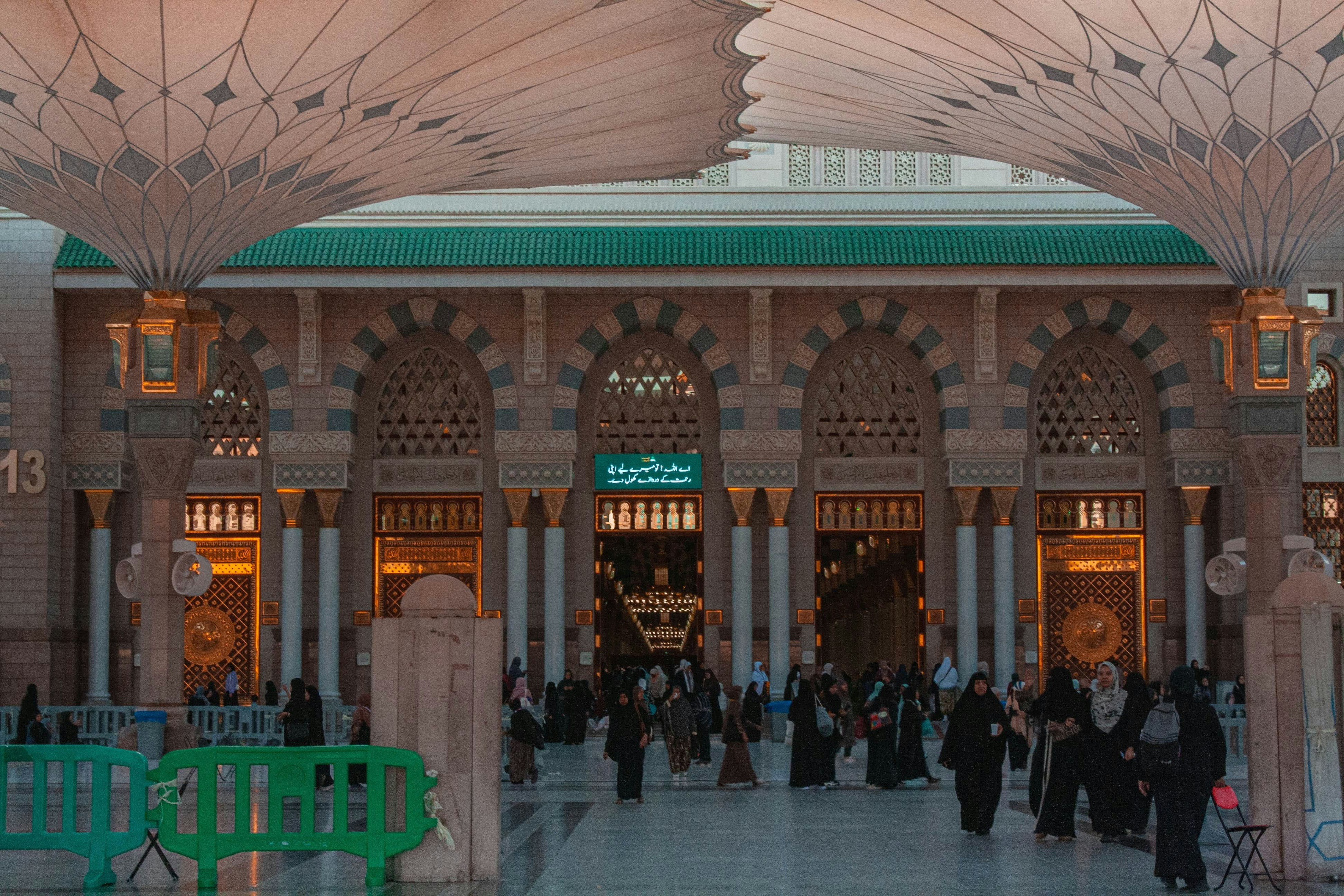 A group of people standing in front of a building