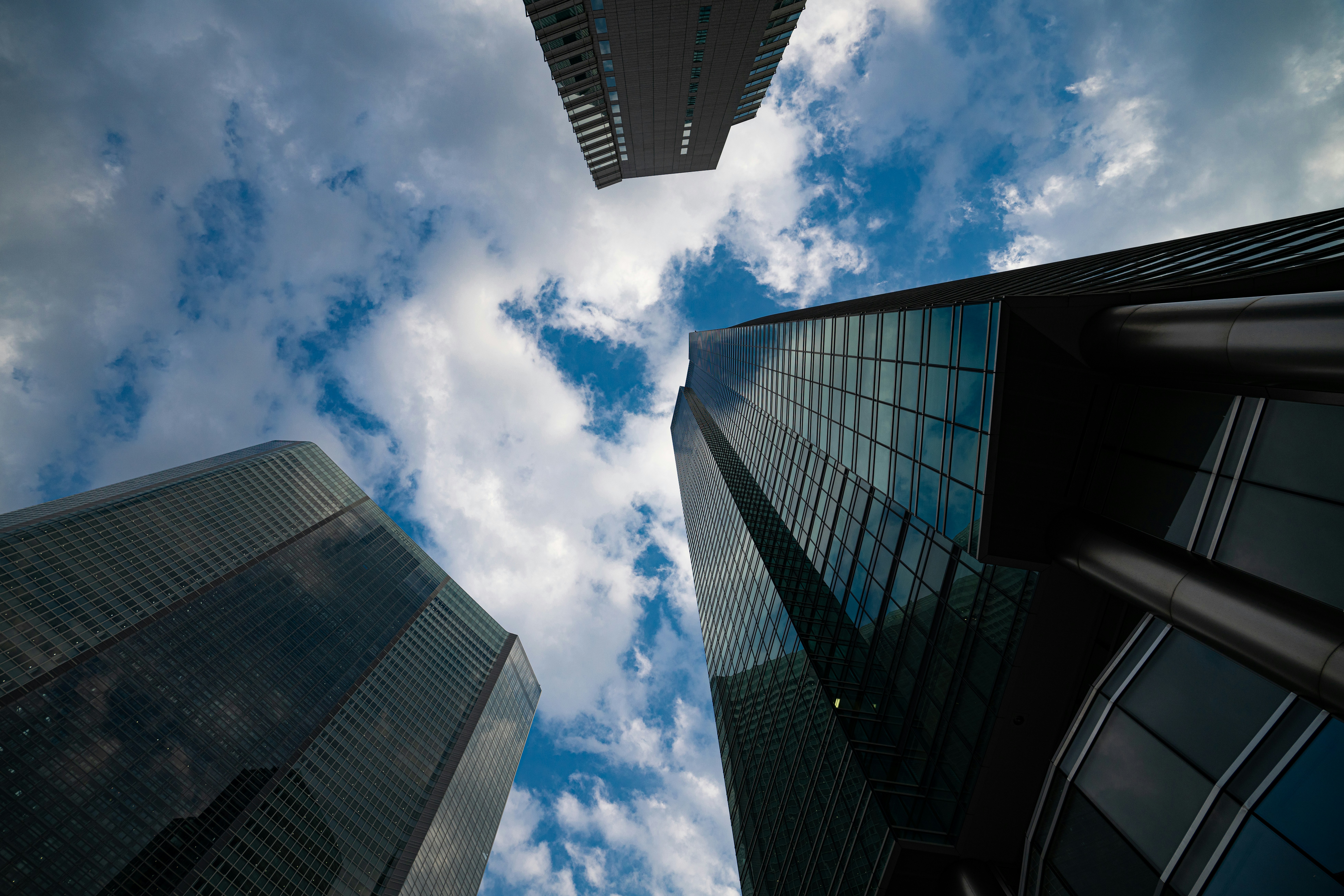 Looking up at tall buildings in a city