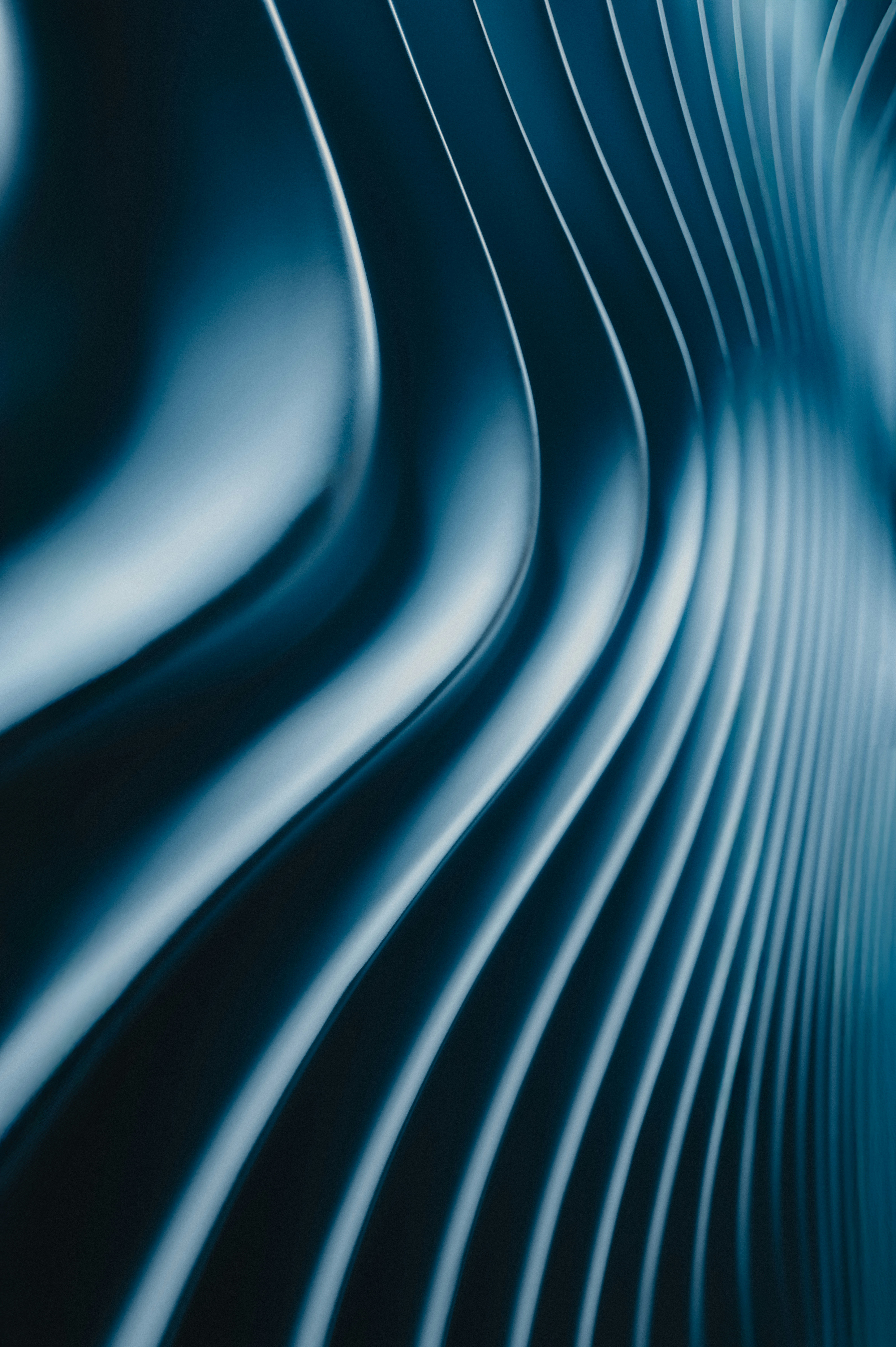 A close up of a blue background with wavy lines