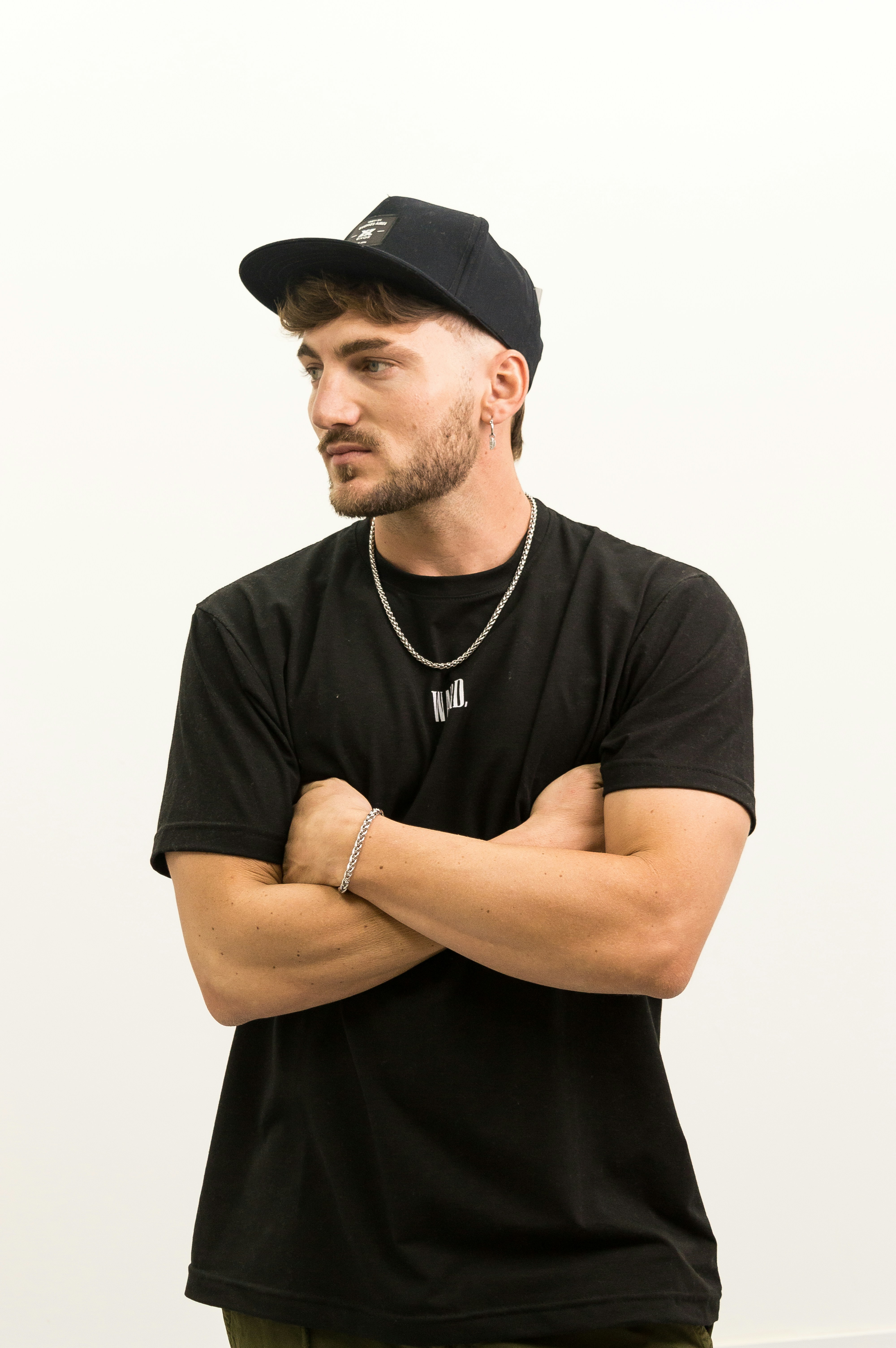A man standing with his arms crossed