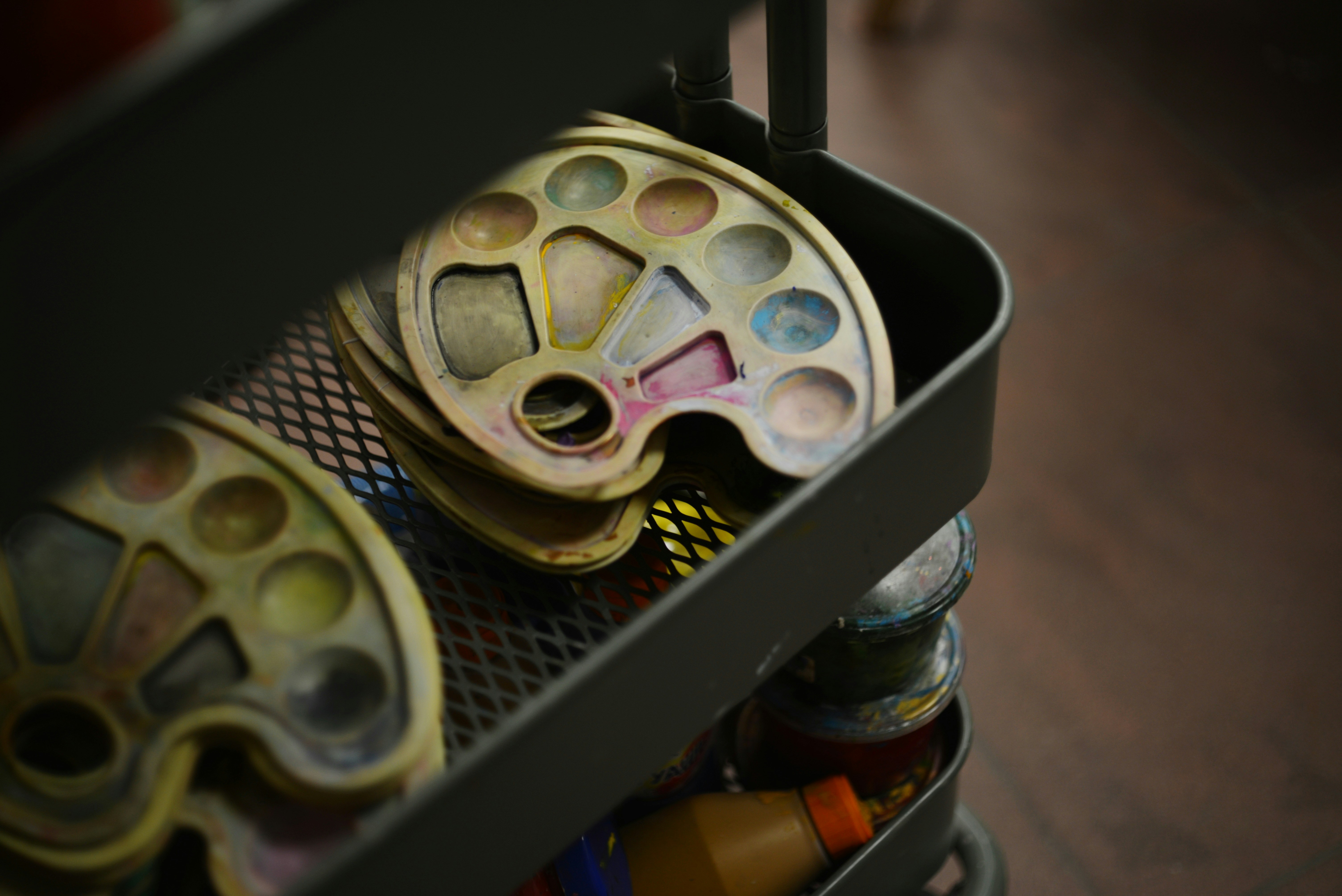 A metal container filled with lots of different items photo – Free ...
