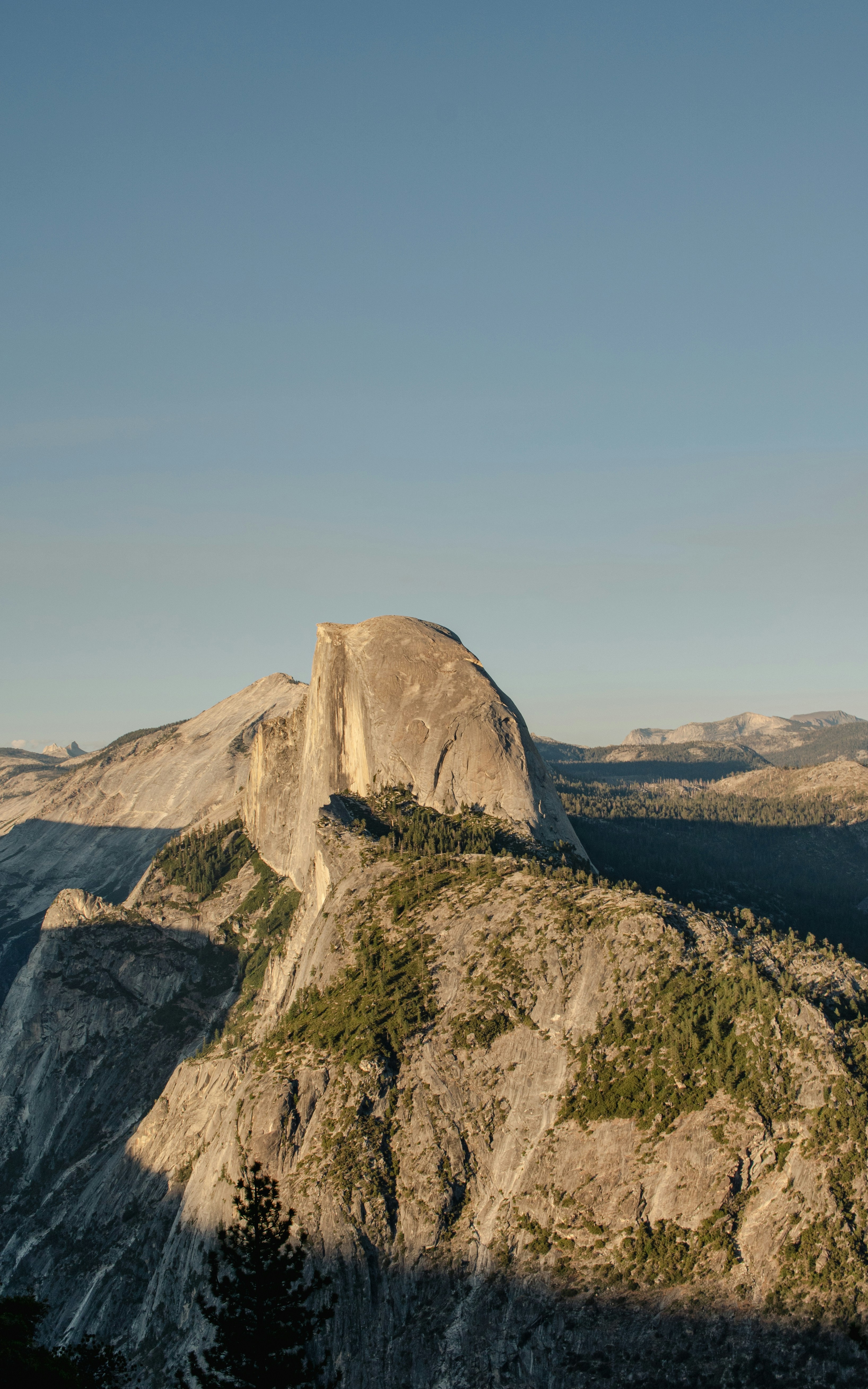 A view of the mountains from the top of a mountain