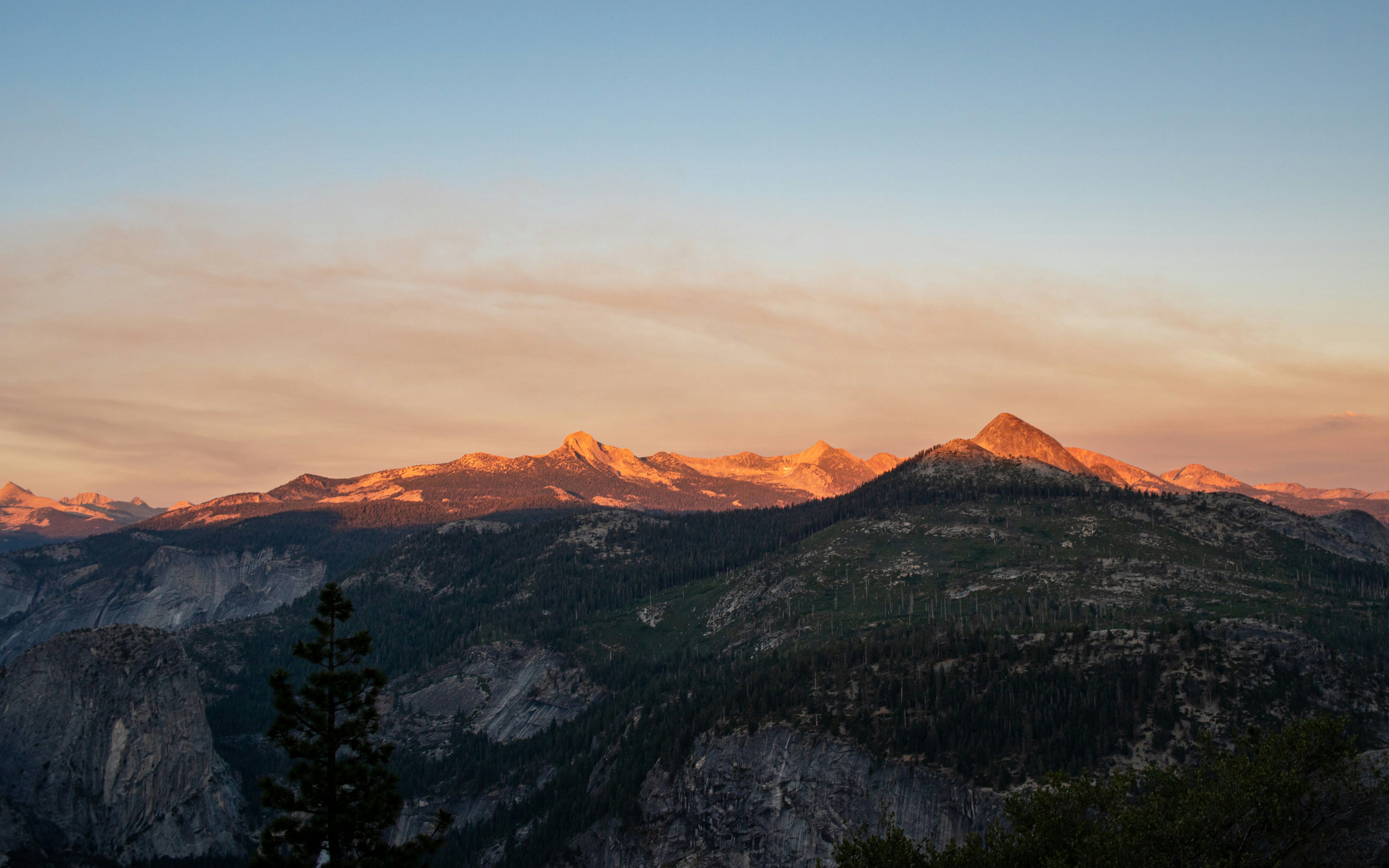 A view of a mountain range at sunset photo – Free Glacier point Image ...