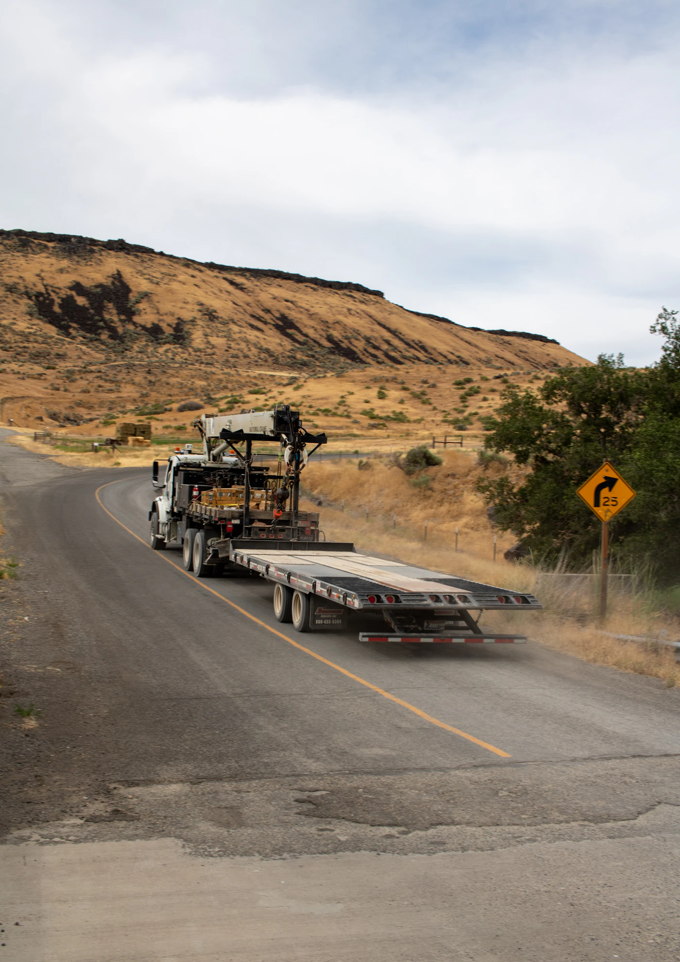 Freight truck driving along a highway