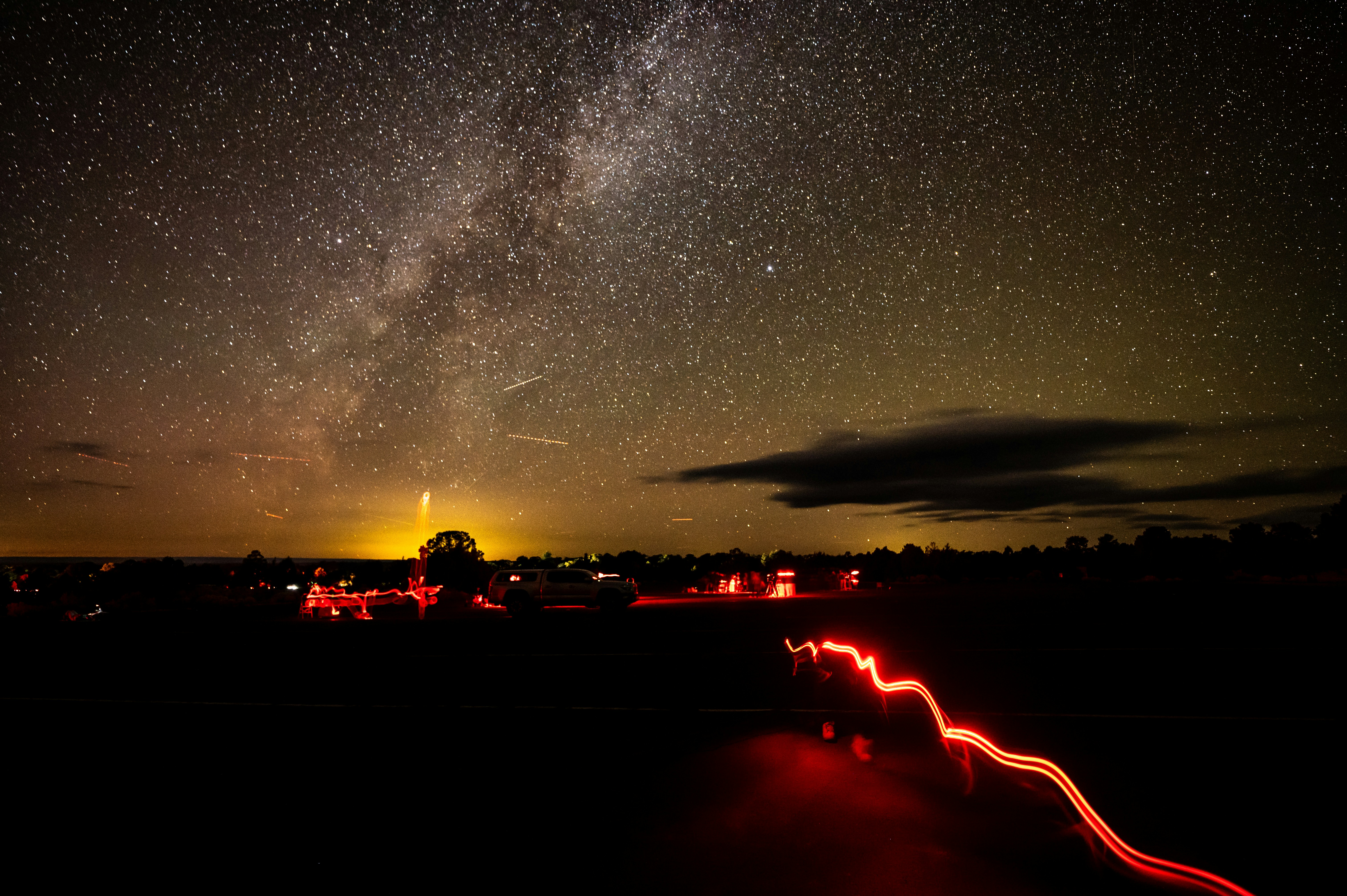 The night sky with stars above a city, Wonders of Grand Canyon
