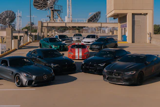 A bunch of cars parked in a parking lot