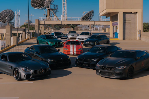 A bunch of cars parked in a parking lot