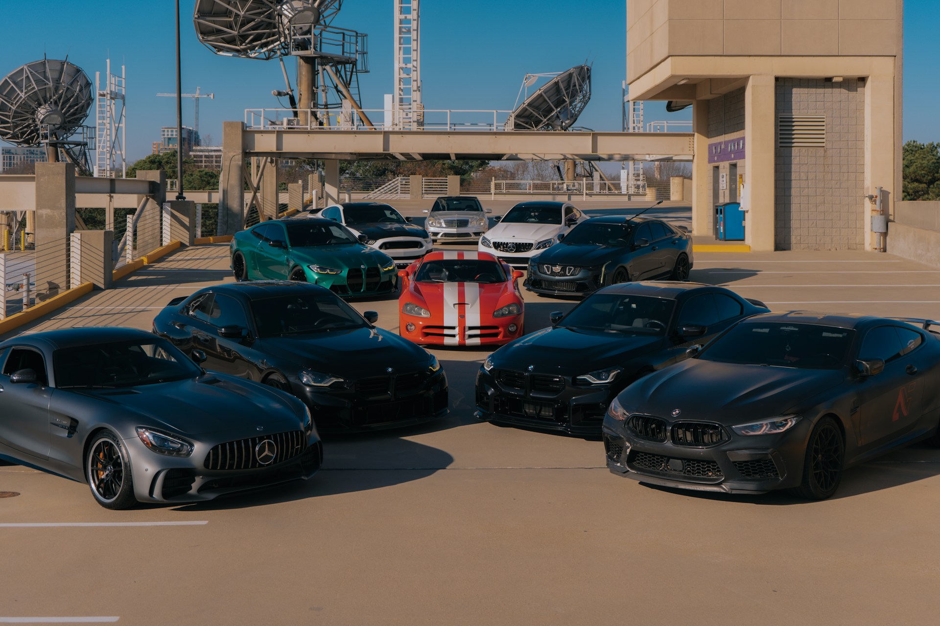 A bunch of cars parked in a parking lot