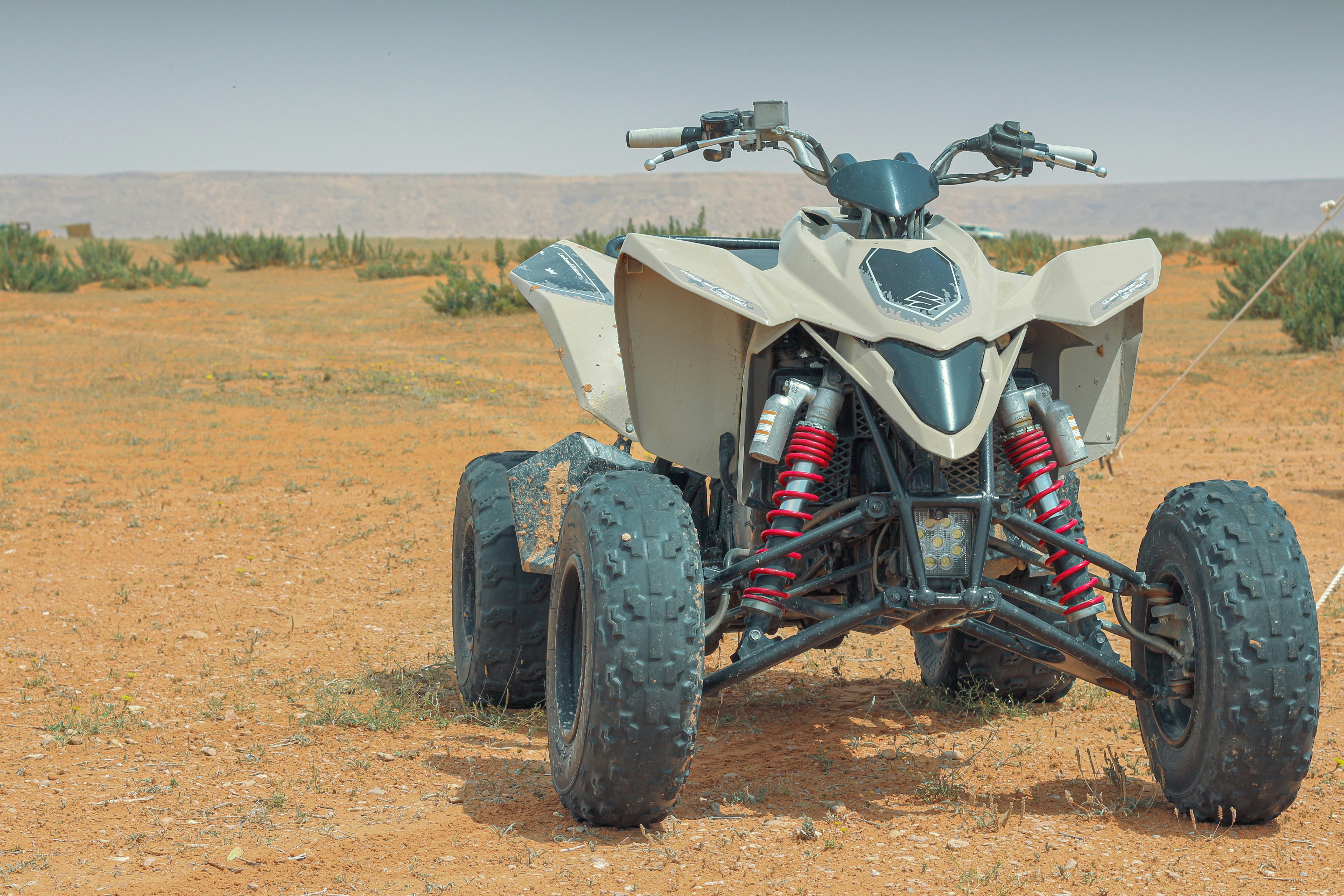 A four - wheeler in the middle of a desert