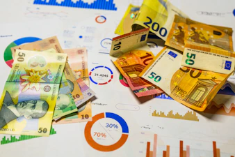 A bunch of money sitting on top of a table