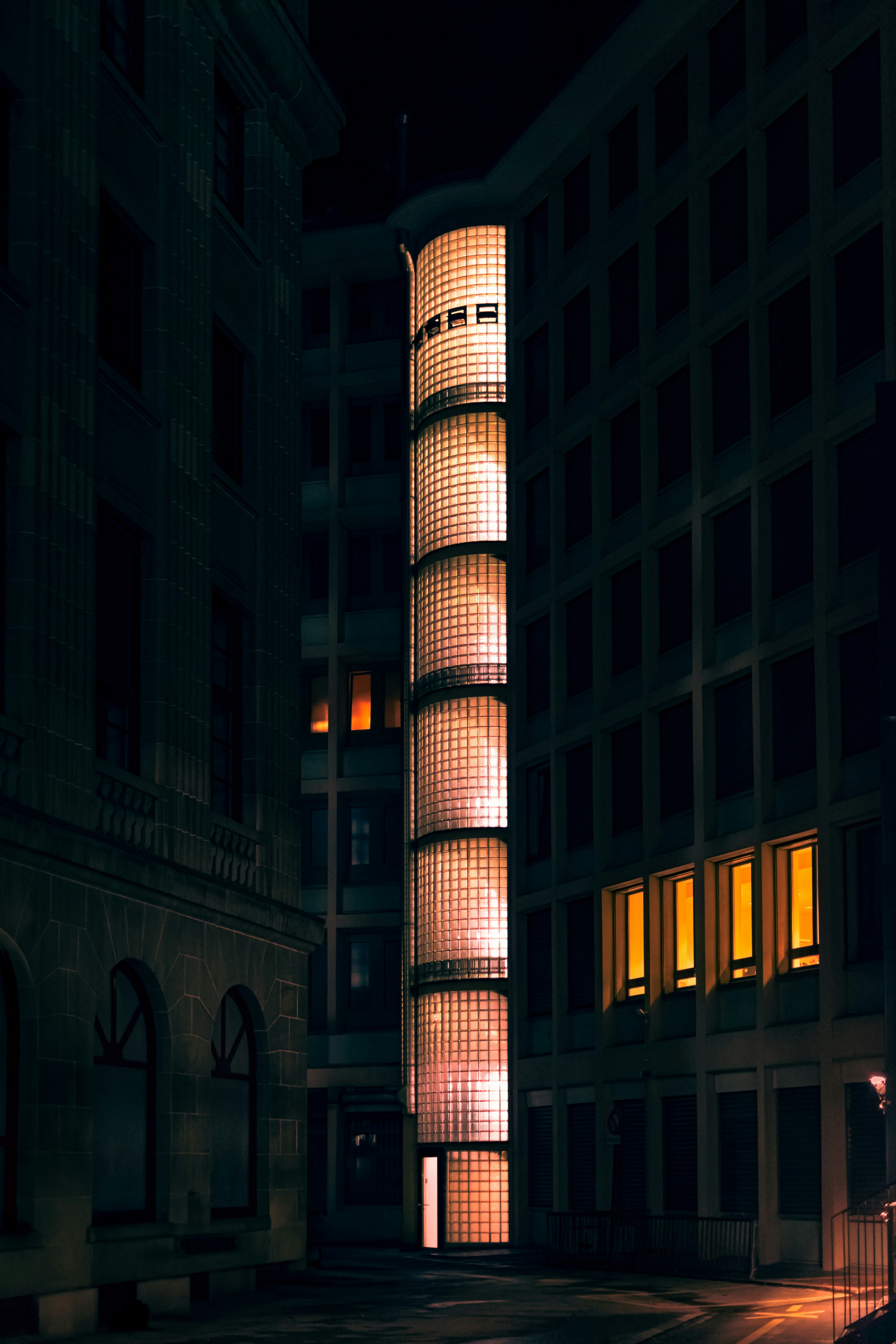 A tall clock tower sitting in the middle of a street