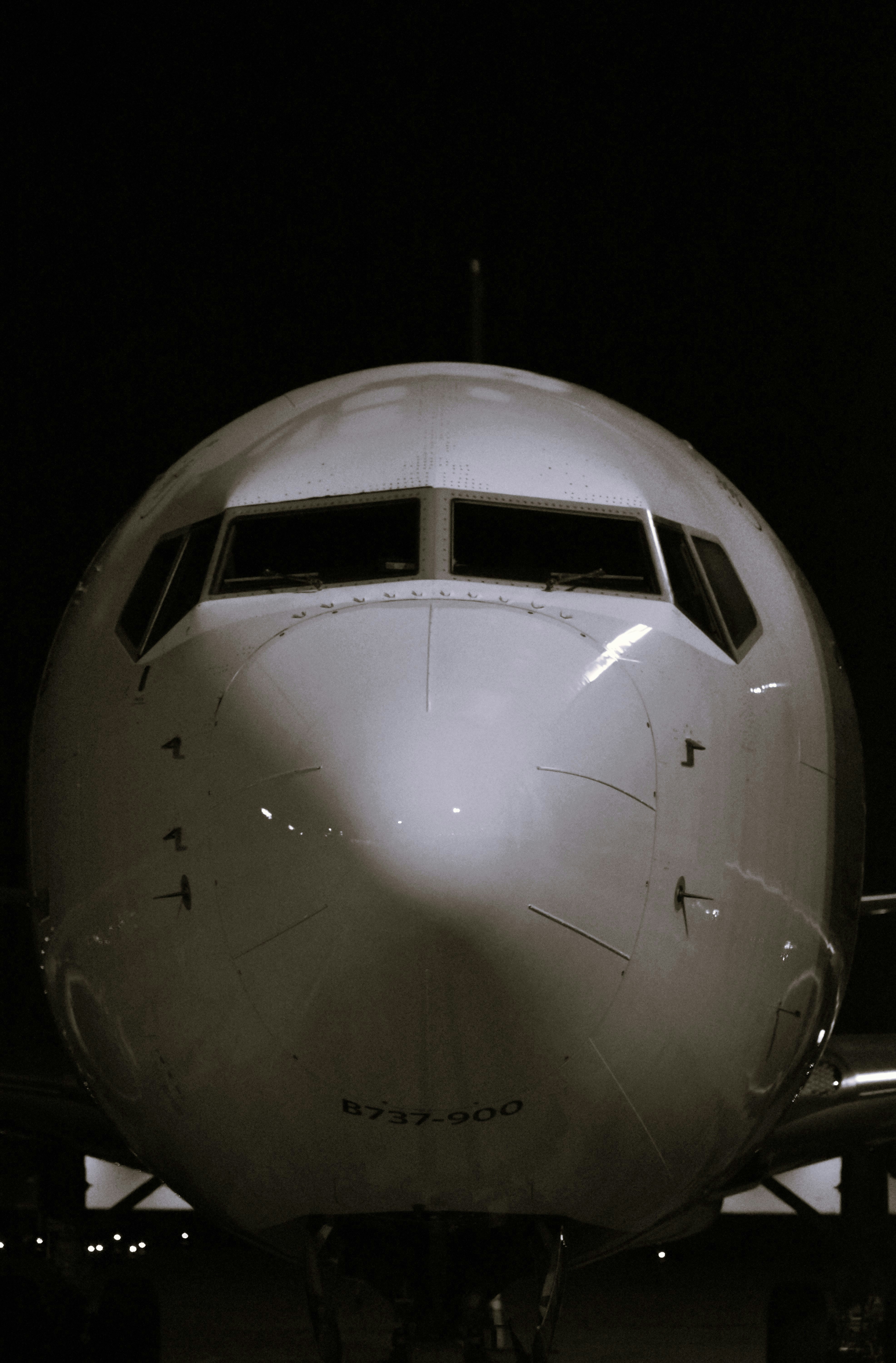 A large jetliner sitting on top of an airport tarmac